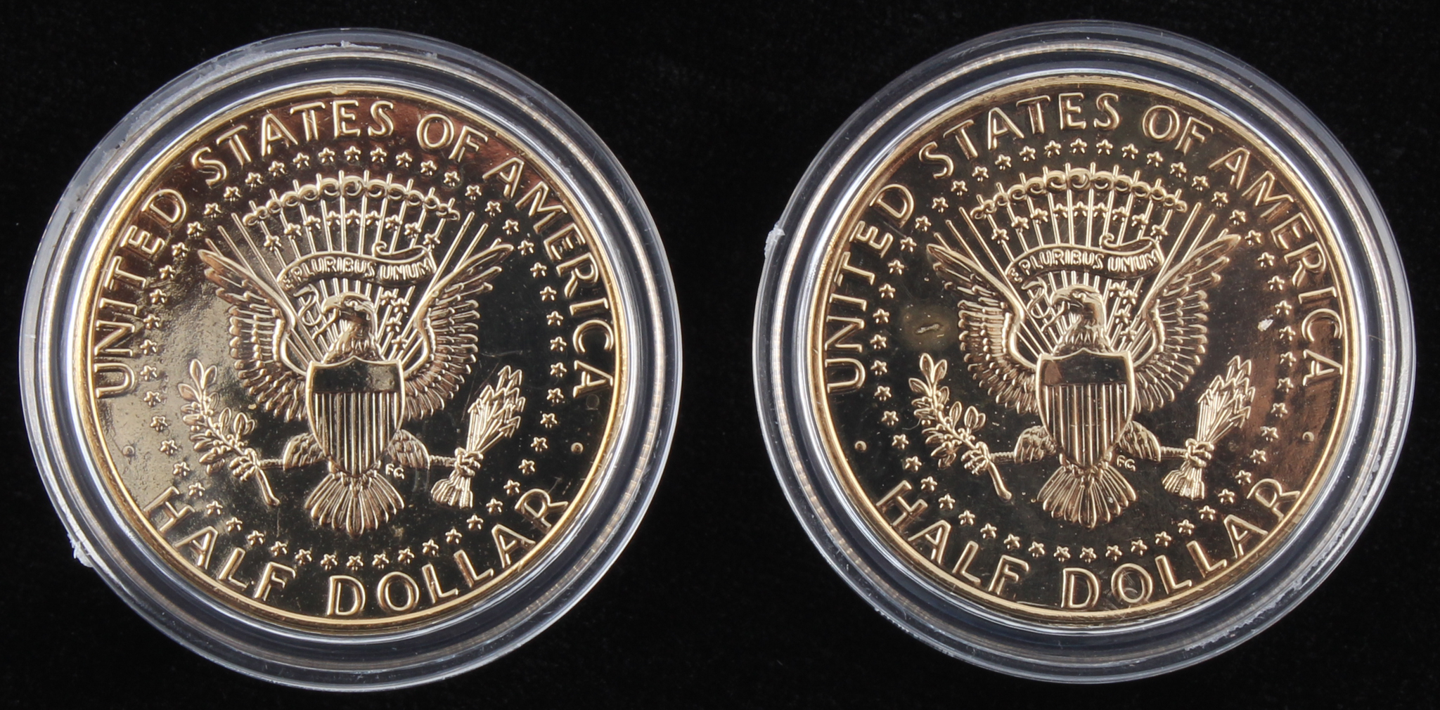 Set of (2) John F. Kennedy Colorized Half-Dollar Coins at PristineAuction.com Set of (2) John F. Kennedy Colorized Half-Dollar Coins at PristineAuction.com