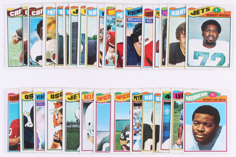 Lot of (33) 1977 Topps Mexican Football Cards with #412 Pat Tilley, #106 Paul Naumoff, #90 Dan Dierdorf, #402 Willie Buchanon