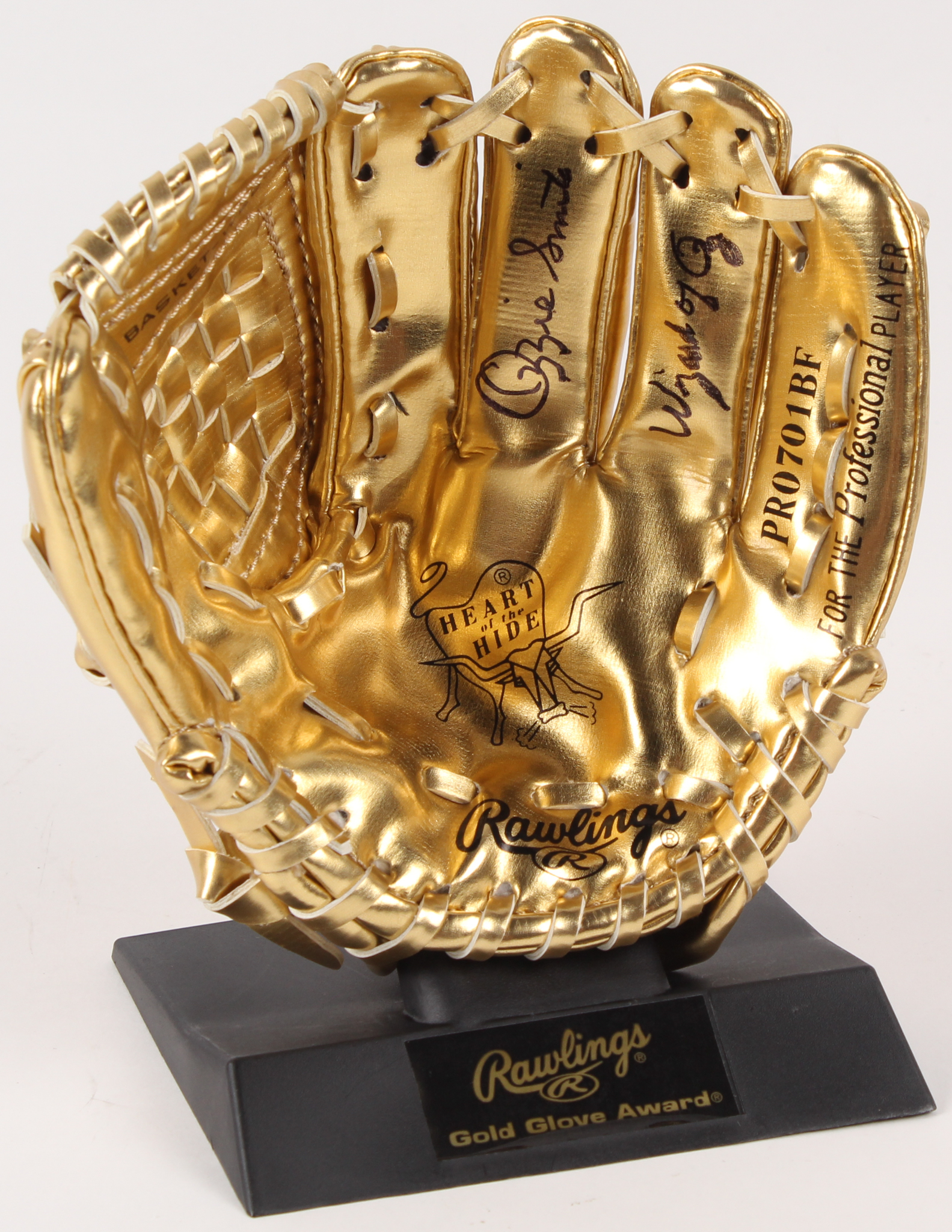 Ozzie Smith Signed Rawlings Gold Mini-Baseball Glove with Display Stand Inscribed "Wizard of Oz" (PSA COA) at PristineAuction.com Ozzie Smith Signed Rawlings Gold Mini-Baseball Glove with Display Stand Inscribed "Wizard of Oz" (PSA COA) at PristineAuction.com