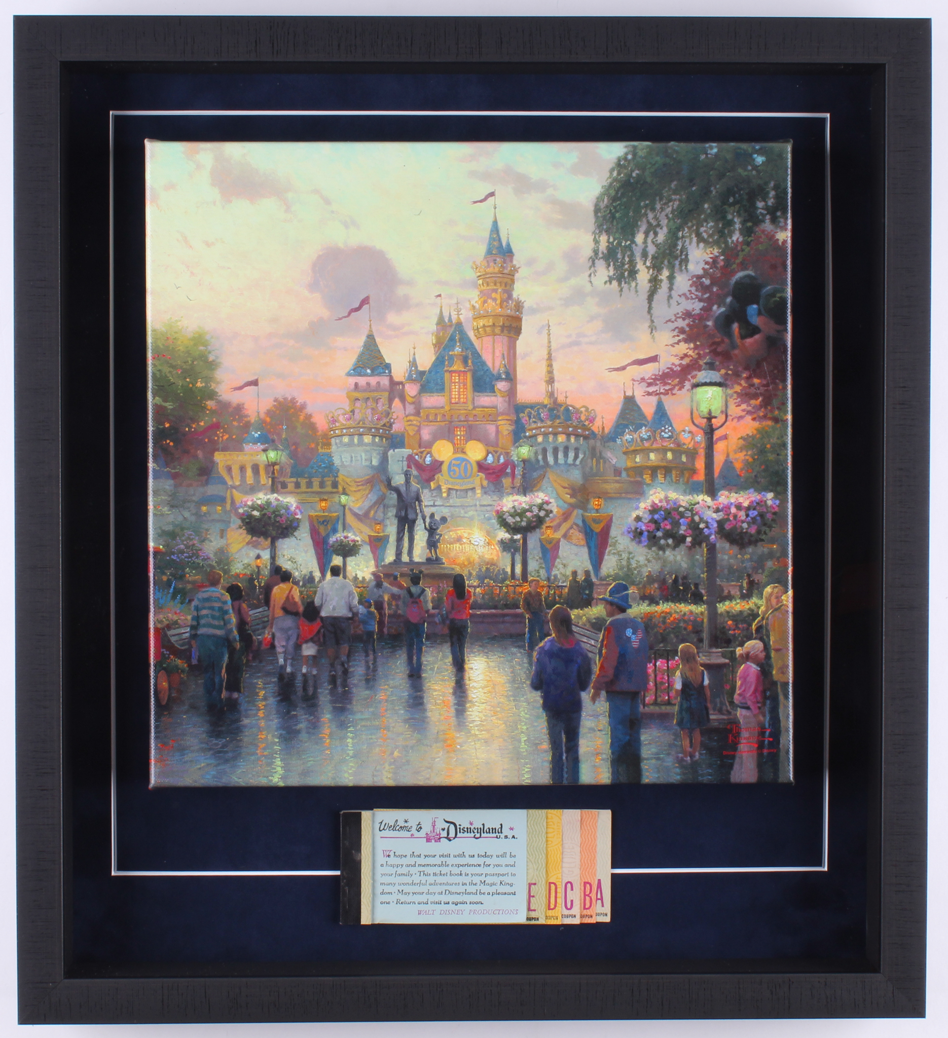 Thomas Kinkade Disneyland 19.5x21.5x2 Custom Framed Print on Canvas Shadowbox Display with Vintage Ticket Booklet at PristineAuction.com Thomas Kinkade Disneyland 19.5x21.5x2 Custom Framed Print on Canvas Shadowbox Display with Vintage Ticket Booklet at PristineAuction.com