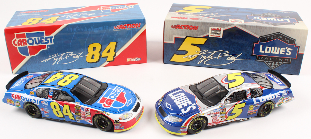 Lot of (2) Kyle Busch LE 1:24 Scale Die Cast Cars with (1) #5 Lowe's 2004 Monte Carlo & (1) #84 CarQuest 2004 Monte Carlo at PristineAuction.com Lot of (2) Kyle Busch LE 1:24 Scale Die Cast Cars with (1) #5 Lowe's 2004 Monte Carlo & (1) #84 CarQuest 2004 Monte Carlo at PristineAuction.com
