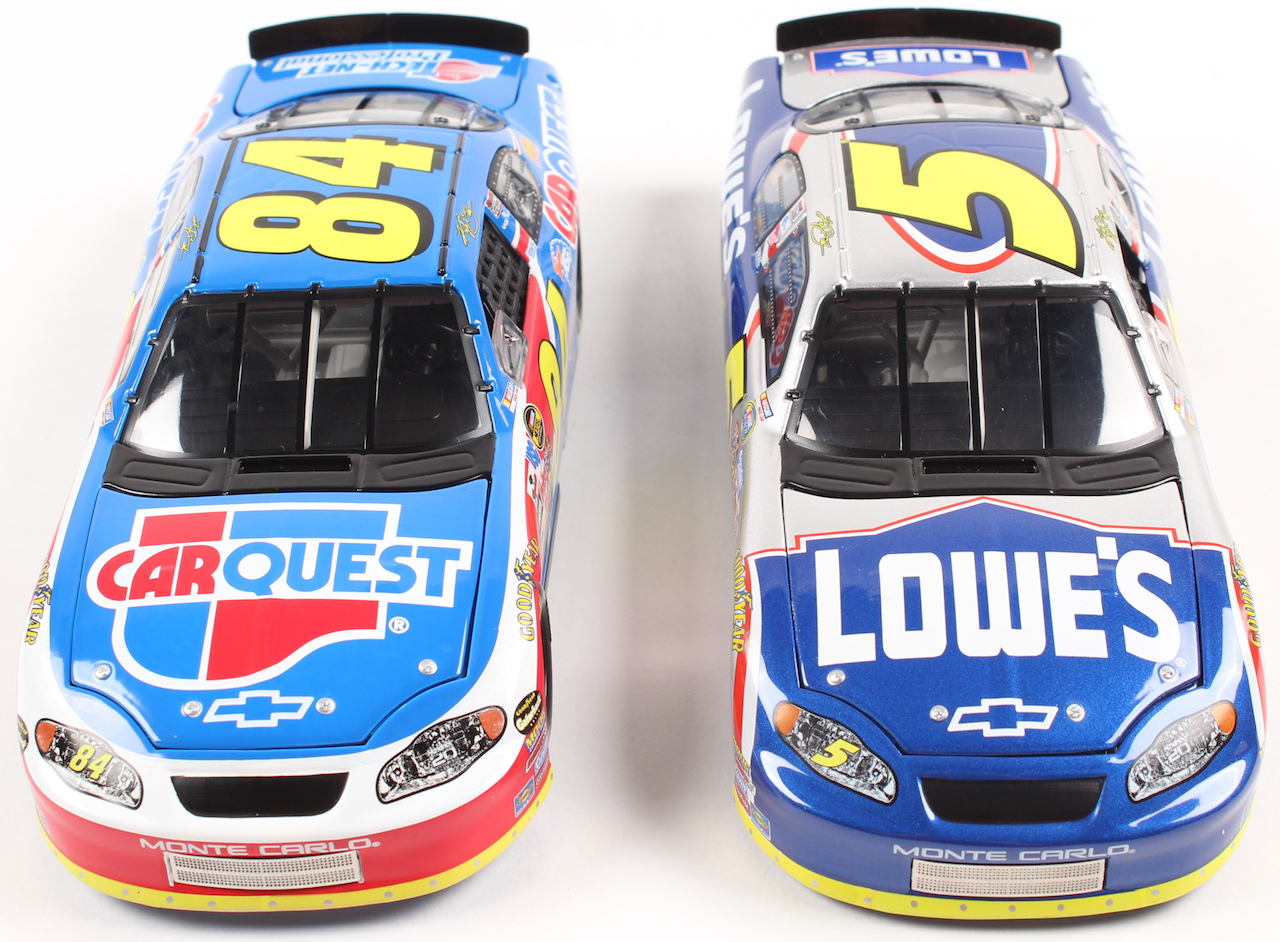 Lot of (2) Kyle Busch LE 1:24 Scale Die Cast Cars with (1) #5 Lowe's 2004 Monte Carlo & (1) #84 CarQuest 2004 Monte Carlo at PristineAuction.com Lot of (2) Kyle Busch LE 1:24 Scale Die Cast Cars with (1) #5 Lowe's 2004 Monte Carlo & (1) #84 CarQuest 2004 Monte Carlo at PristineAuction.com