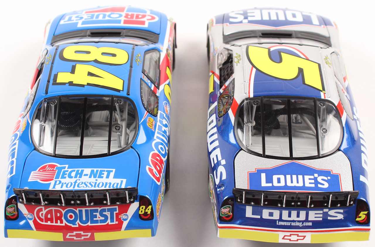 Lot of (2) Kyle Busch LE 1:24 Scale Die Cast Cars with (1) #5 Lowe's 2004 Monte Carlo & (1) #84 CarQuest 2004 Monte Carlo at PristineAuction.com Lot of (2) Kyle Busch LE 1:24 Scale Die Cast Cars with (1) #5 Lowe's 2004 Monte Carlo & (1) #84 CarQuest 2004 Monte Carlo at PristineAuction.com