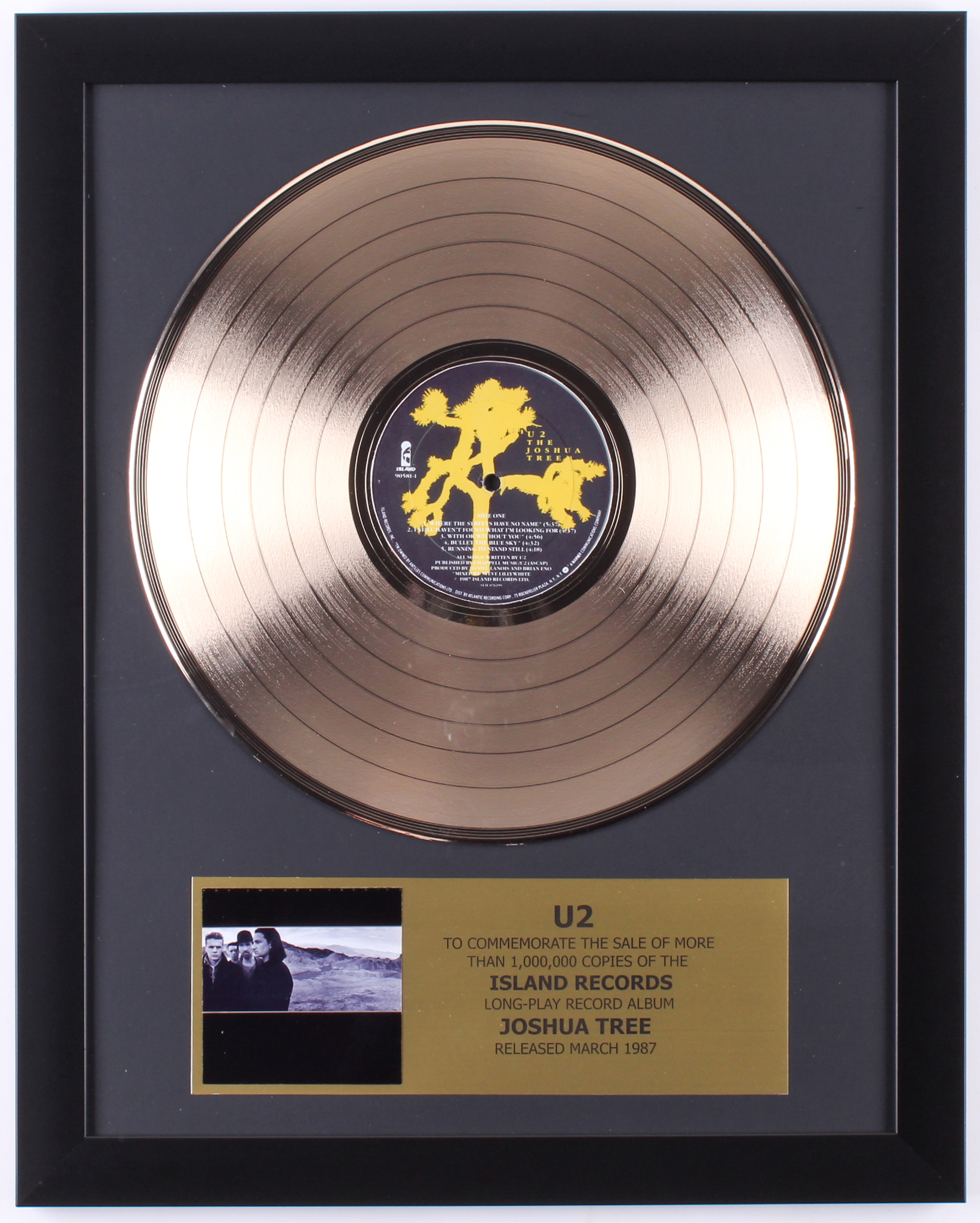 U2 Custom Framed 15.75x19.5 Gold Plated "The Joshua Tree" Record Album Award Display at PristineAuction.com U2 Custom Framed 15.75x19.5 Gold Plated "The Joshua Tree" Record Album Award Display at PristineAuction.com