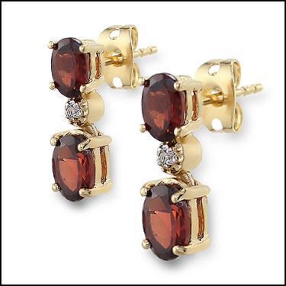 2.52 CTW Garnet & Diamond 18K Gold Plated Designer Earrings | Estimated Value $1,119 (AMG) at PristineAuction.com 2.52 CTW Garnet & Diamond 18K Gold Plated Designer Earrings | Estimated Value $1,119 (AMG) at PristineAuction.com