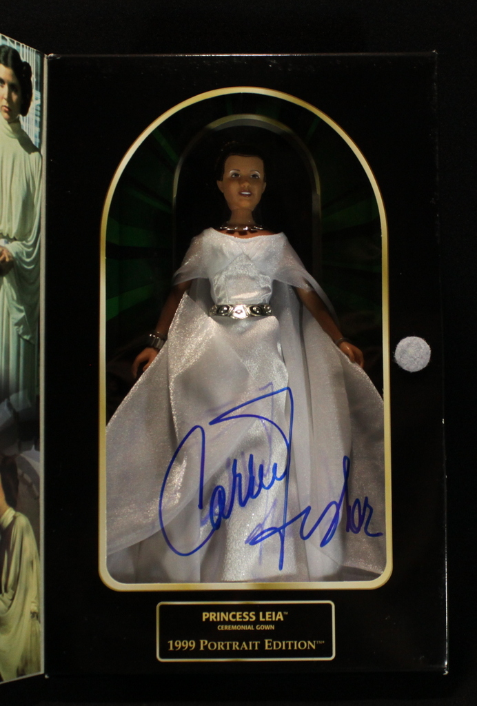 Carrie Fisher Signed Star Wars 1999 Portrait Edition Princess Leia Action Figure (JSA) at PristineAuction.com Carrie Fisher Signed Star Wars 1999 Portrait Edition Princess Leia Action Figure (JSA) at PristineAuction.com