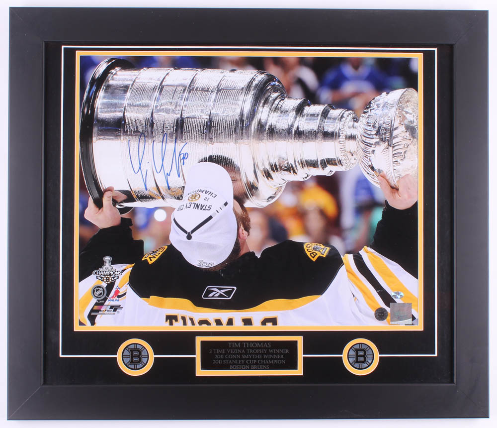 Tim Thomas Signed Bruins 2011 Stanley Cup Champions 23.5x27.5 Custom Framed Photo Display (Thomas Hologram & Sure Shot Promotions Hologram) at PristineAuction.com Tim Thomas Signed Bruins 2011 Stanley Cup Champions 23.5x27.5 Custom Framed Photo Display (Thomas Hologram & Sure Shot Promotions Hologram) at PristineAuction.com