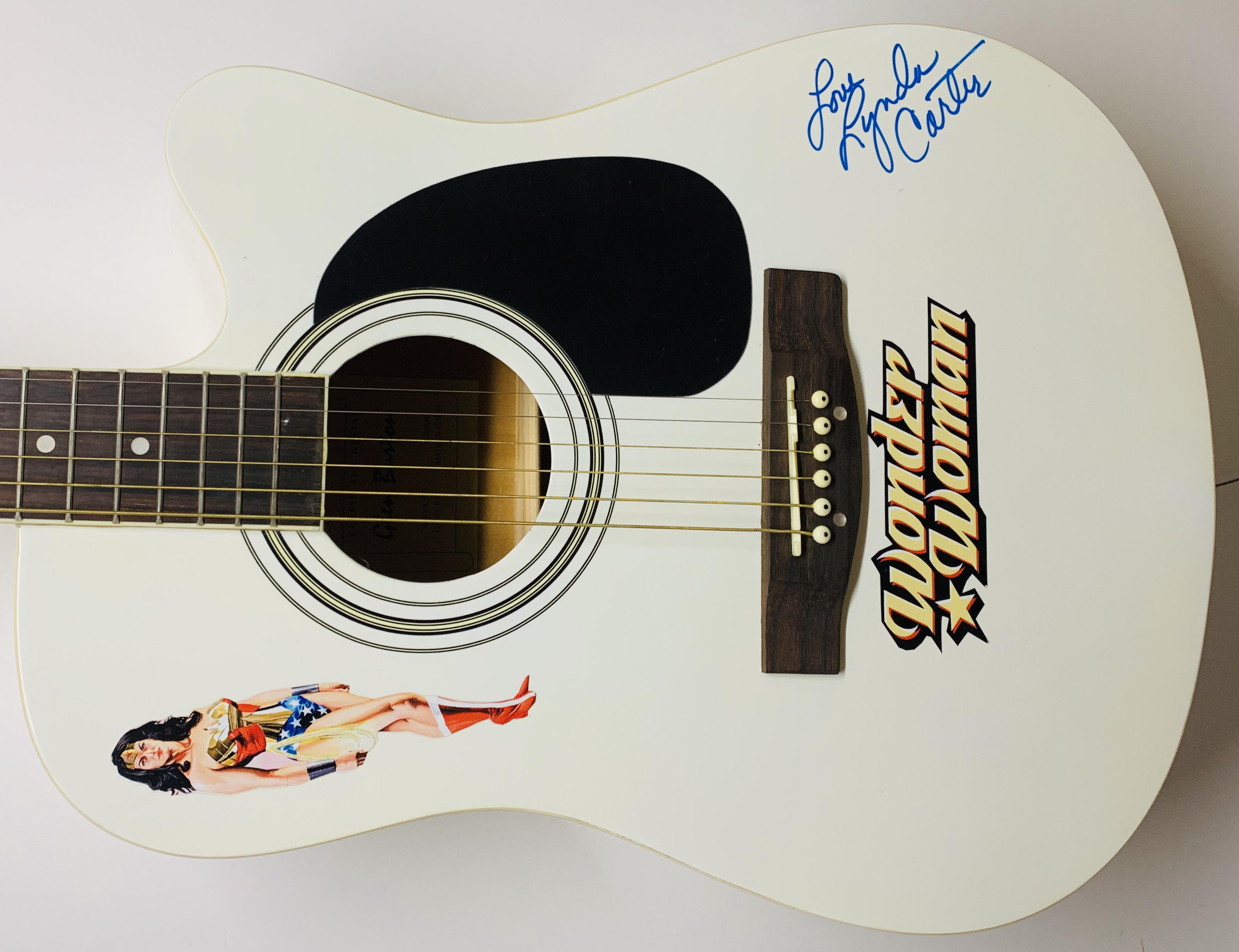 Lynda Carter Signed "Wonder Woman" Acoustic Guitar Inscribed "Love" (JSA COA) at PristineAuction.com Lynda Carter Signed "Wonder Woman" Acoustic Guitar Inscribed "Love" (JSA COA) at PristineAuction.com
