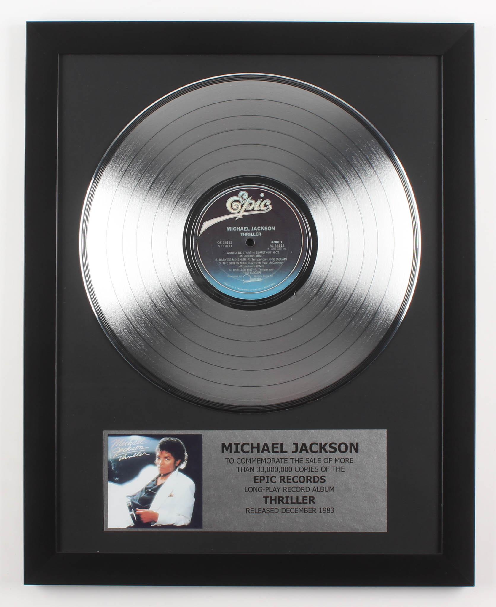 Michael Jackson Custom Framed 15.75x19.75 Silver Plated "Thriller" Record Album Award Display at PristineAuction.com Michael Jackson Custom Framed 15.75x19.75 Silver Plated "Thriller" Record Album Award Display at PristineAuction.com