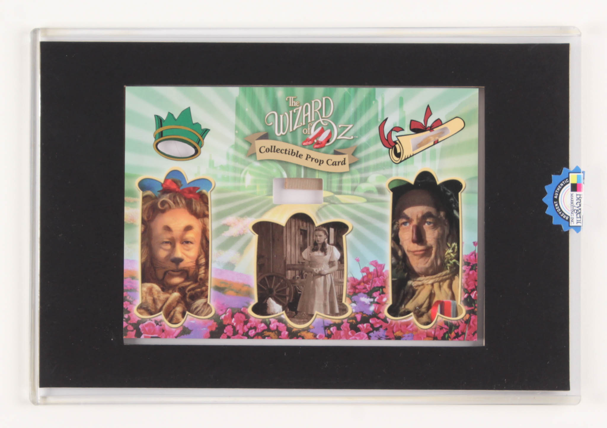 "Wizard of Oz" Prop Card Display With Piece of Wagon Wheel, Straw From Scarecrow & Hair From Lion (Odyssey COA) at PristineAuction.com "Wizard of Oz" Prop Card Display With Piece of Wagon Wheel, Straw From Scarecrow & Hair From Lion (Odyssey COA) at PristineAuction.com