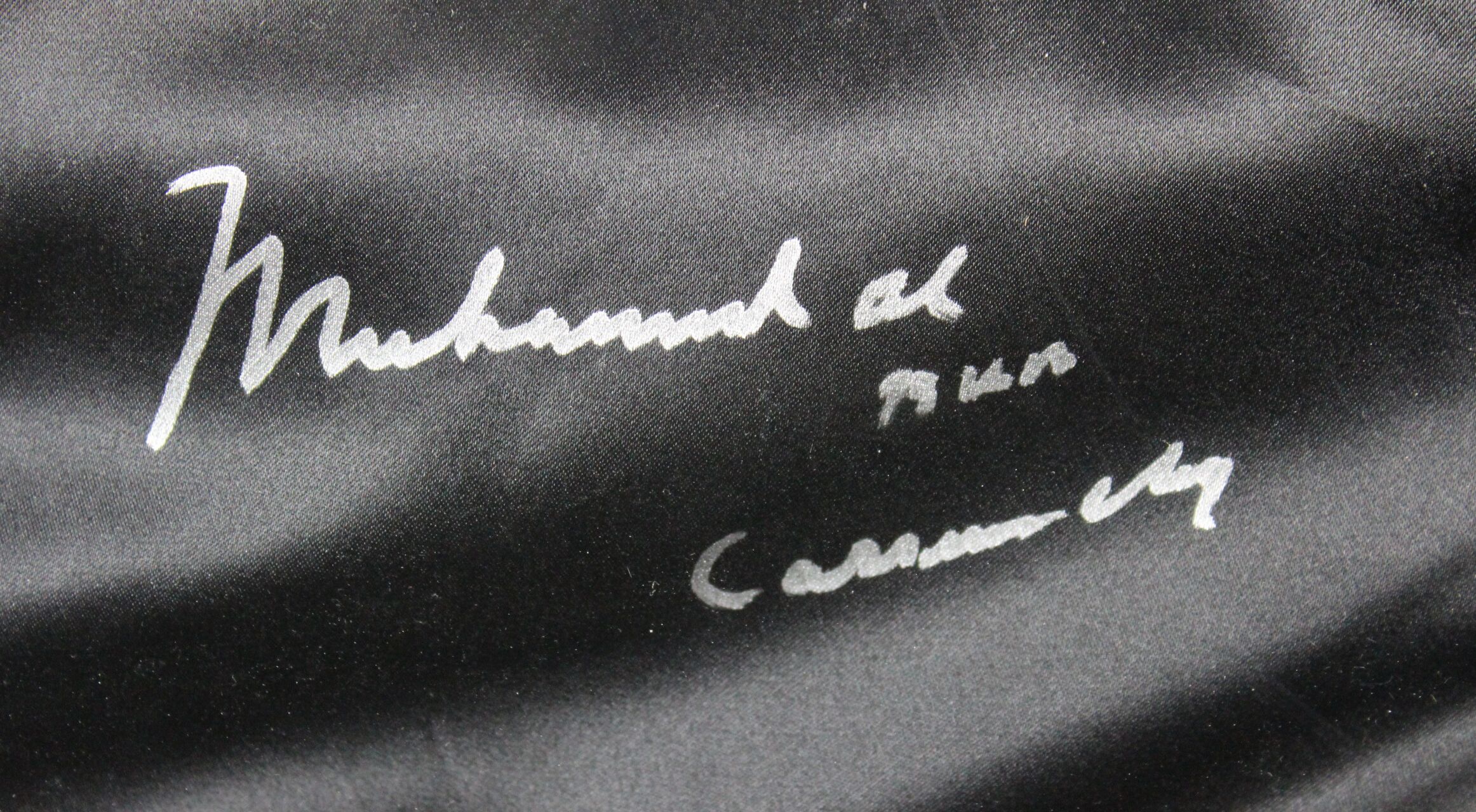 Muhammad Ali Signed 35x42 Custom Framed Boxing Trunks Display Inscribed "AKA Cassius Clay" (JSA LOA) at PristineAuction.com Muhammad Ali Signed 35x42 Custom Framed Boxing Trunks Display Inscribed "AKA Cassius Clay" (JSA LOA) at PristineAuction.com