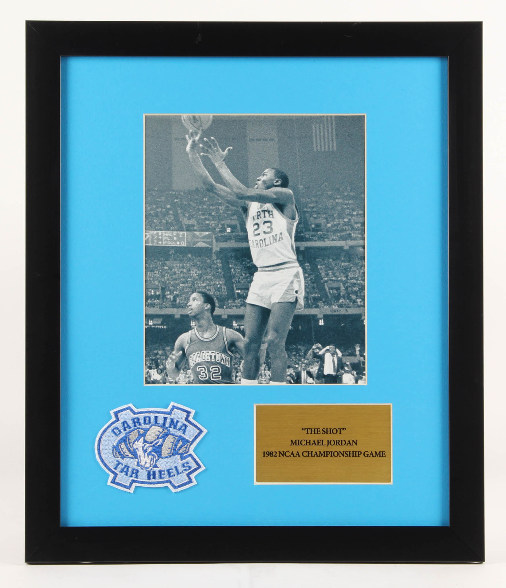 Michael Jordan North Carolina Tar Heels "The Shot" 16x19 Custom Framed Photo Display with Patch at PristineAuction.com Michael Jordan North Carolina Tar Heels "The Shot" 16x19 Custom Framed Photo Display with Patch at PristineAuction.com