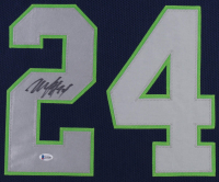 Marshawn Lynch Signed 35x43 Custom Framed Jersey (Beckett Hologram) at PristineAuction.com