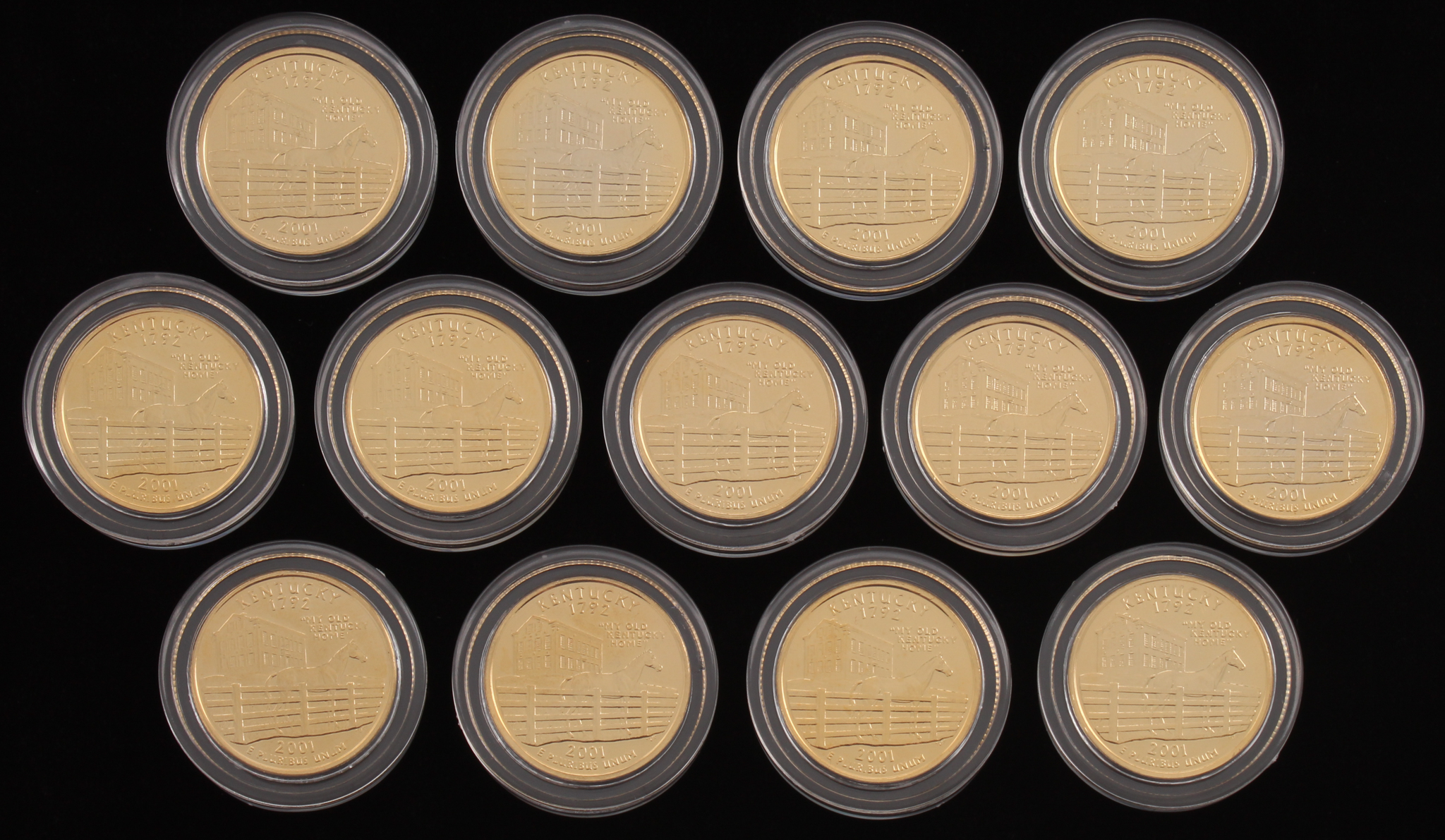 Lot of (13) Triple Crown Winners Colorized Gold Plated Statehood Quarters at PristineAuction.com Lot of (13) Triple Crown Winners Colorized Gold Plated Statehood Quarters at PristineAuction.com