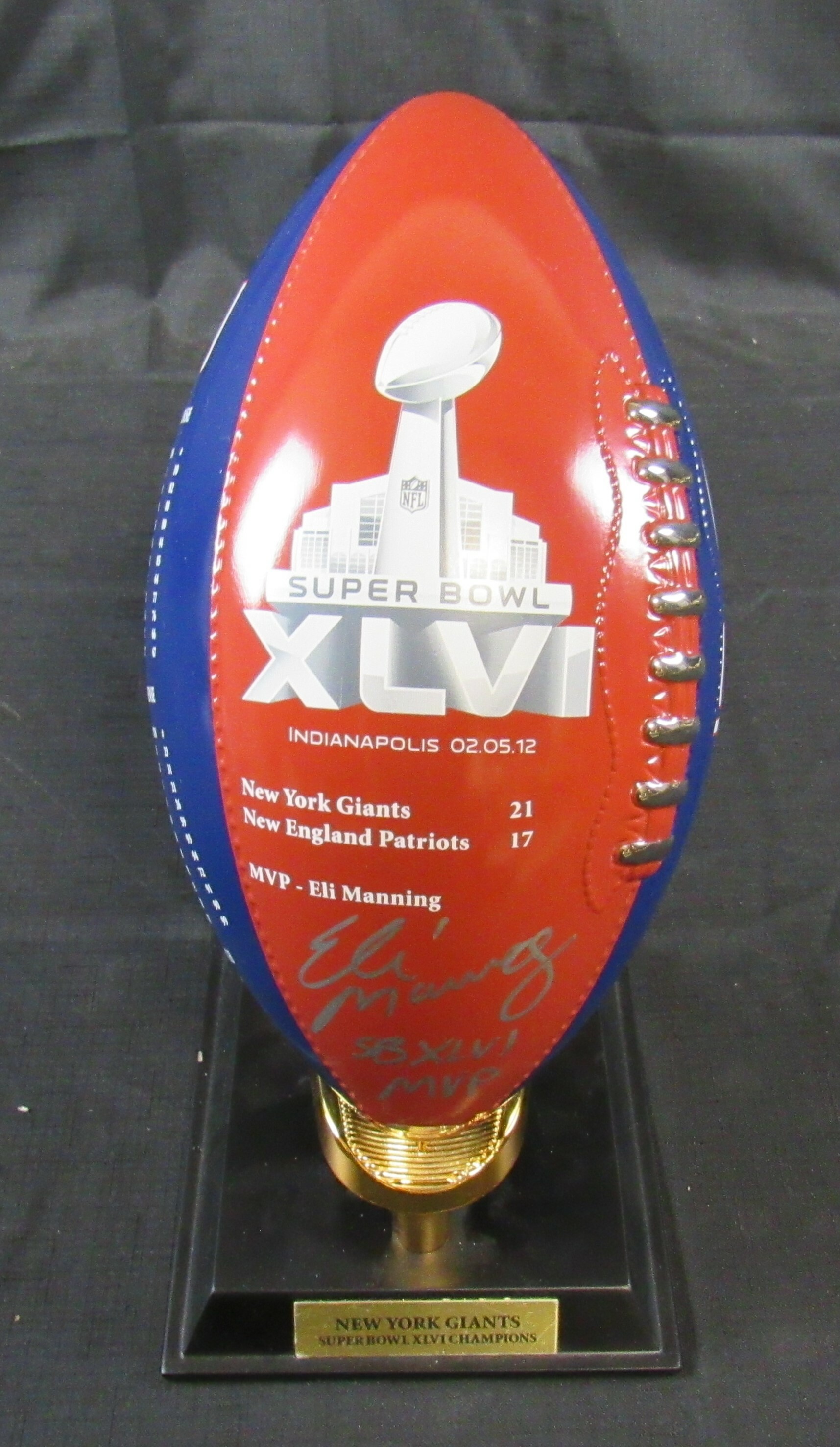 Eli Manning Signed New York Giants Danbury Mint Super Bowl Porcelain Football Trophy Inscribed "SB XLVI MVP" (Steiner Hologram) at PristineAuction.com Eli Manning Signed New York Giants Danbury Mint Super Bowl Porcelain Football Trophy Inscribed "SB XLVI MVP" (Steiner Hologram) at PristineAuction.com