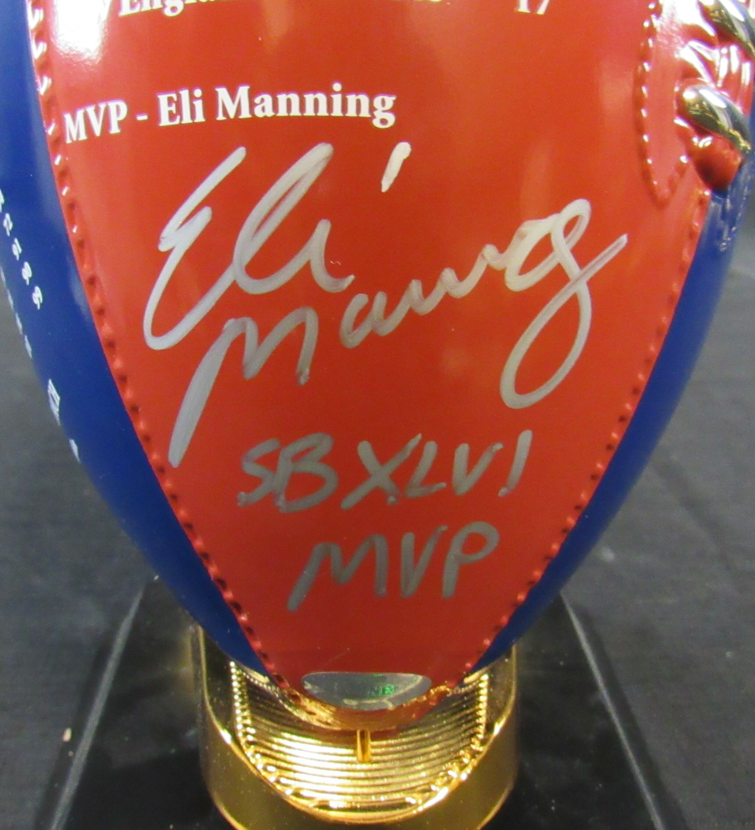 Eli Manning Signed New York Giants Danbury Mint Super Bowl Porcelain Football Trophy Inscribed "SB XLVI MVP" (Steiner Hologram) at PristineAuction.com Eli Manning Signed New York Giants Danbury Mint Super Bowl Porcelain Football Trophy Inscribed "SB XLVI MVP" (Steiner Hologram) at PristineAuction.com
