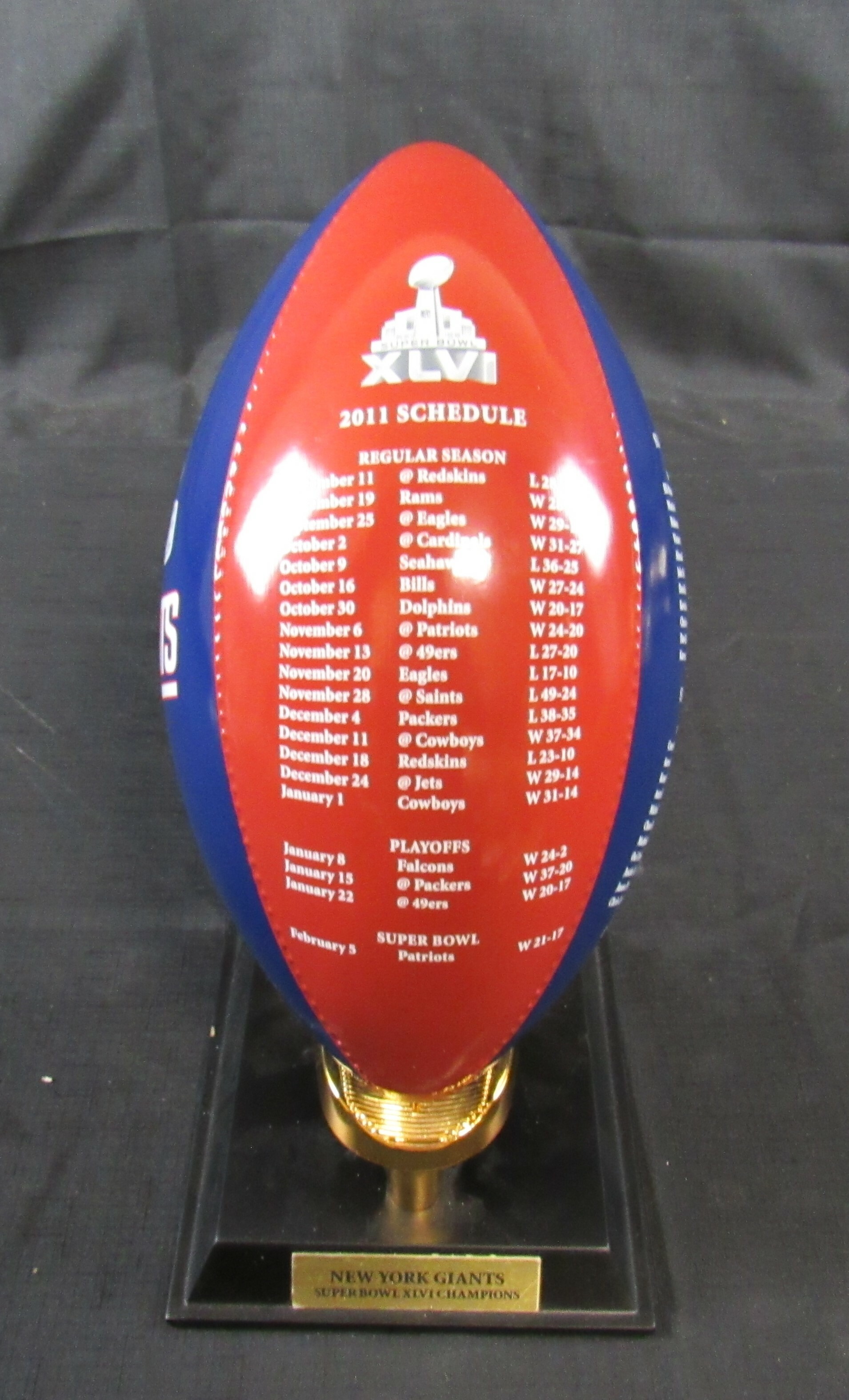 Eli Manning Signed New York Giants Danbury Mint Super Bowl Porcelain Football Trophy Inscribed "SB XLVI MVP" (Steiner Hologram) at PristineAuction.com Eli Manning Signed New York Giants Danbury Mint Super Bowl Porcelain Football Trophy Inscribed "SB XLVI MVP" (Steiner Hologram) at PristineAuction.com