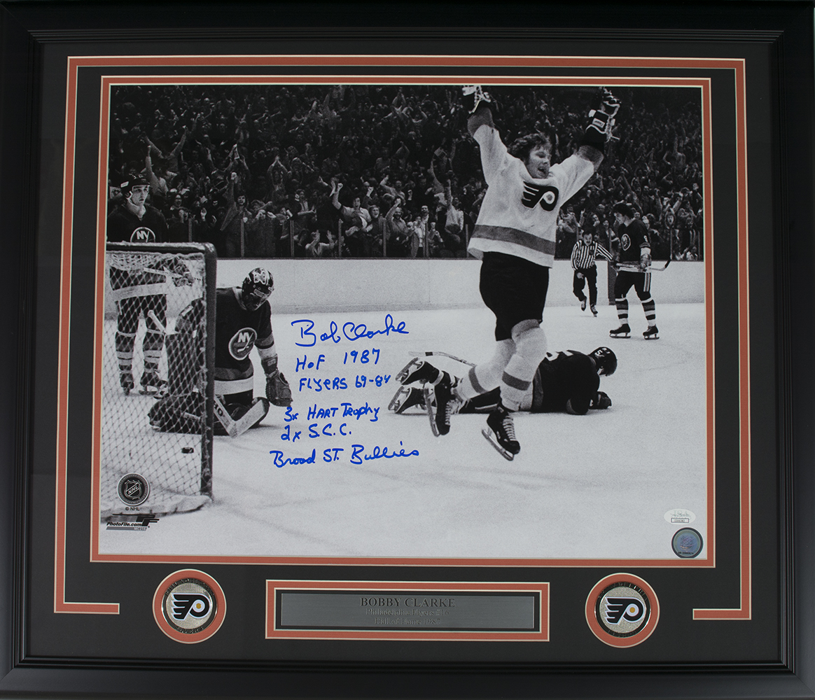 Bob Clarke Signed Philadelphia Flyers 22x27 Custom Framed Photo Display with (5) Inscriptions (JSA COA) at PristineAuction.com Bob Clarke Signed Philadelphia Flyers 22x27 Custom Framed Photo Display with (5) Inscriptions (JSA COA) at PristineAuction.com