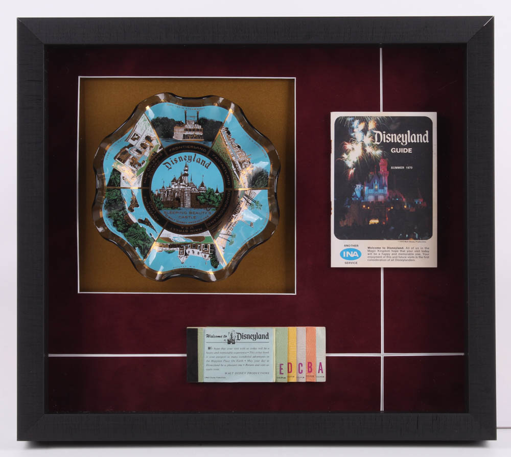 Disneyland 15.5x17.5x2 Custom Framed Ashtray Shadowbox Display with Vintage Booklet & Ticket at PristineAuction.com Disneyland 15.5x17.5x2 Custom Framed Ashtray Shadowbox Display with Vintage Booklet & Ticket at PristineAuction.com