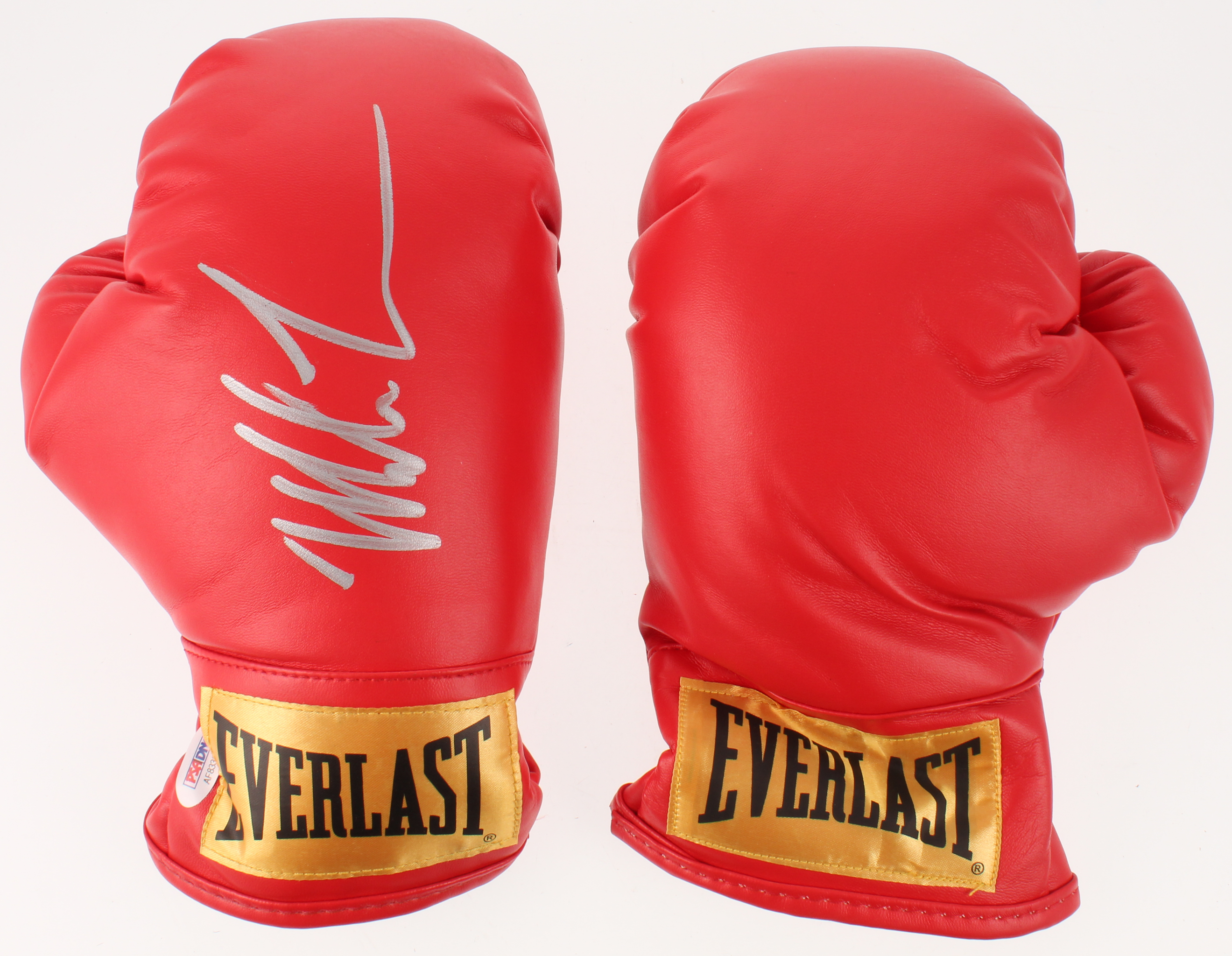 Mike Tyson Signed Everlast Boxing Glove Pair with Display Case (PSA COA) at PristineAuction.com Mike Tyson Signed Everlast Boxing Glove Pair with Display Case (PSA COA) at PristineAuction.com
