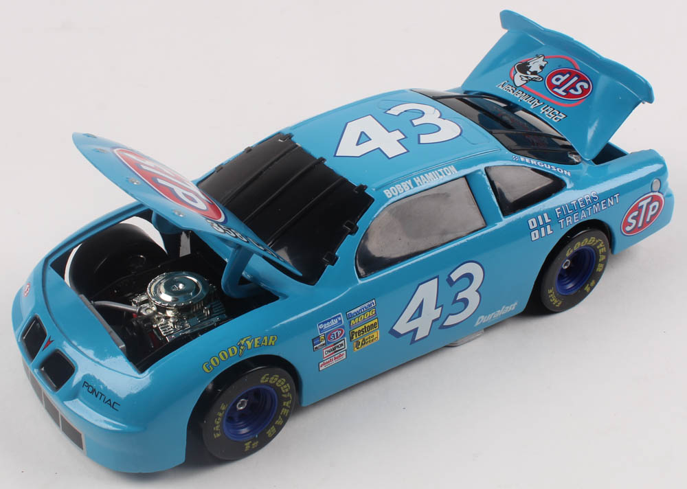 Richard Petty LE #43 STP Pontiac 25th Anniversary Bobby Hamilton Bank 1:24 Scale Stock Car Coin Bank at PristineAuction.com Richard Petty LE #43 STP Pontiac 25th Anniversary Bobby Hamilton Bank 1:24 Scale Stock Car Coin Bank at PristineAuction.com
