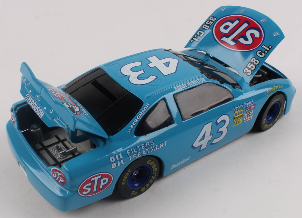 Richard Petty LE #43 STP Pontiac 25th Anniversary Bobby Hamilton Bank 1:24 Scale Stock Car Coin Bank at PristineAuction.com Richard Petty LE #43 STP Pontiac 25th Anniversary Bobby Hamilton Bank 1:24 Scale Stock Car Coin Bank at PristineAuction.com