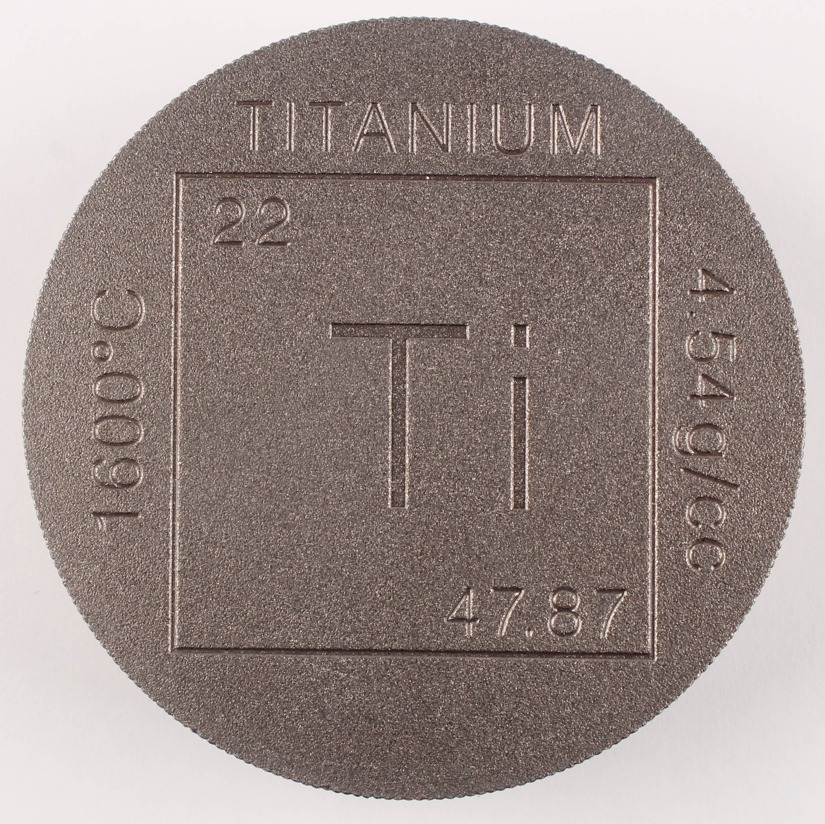 One Pound .999 Fine Titanium Element Design Bullion Round at PristineAuction.com One Pound .999 Fine Titanium Element Design Bullion Round at PristineAuction.com