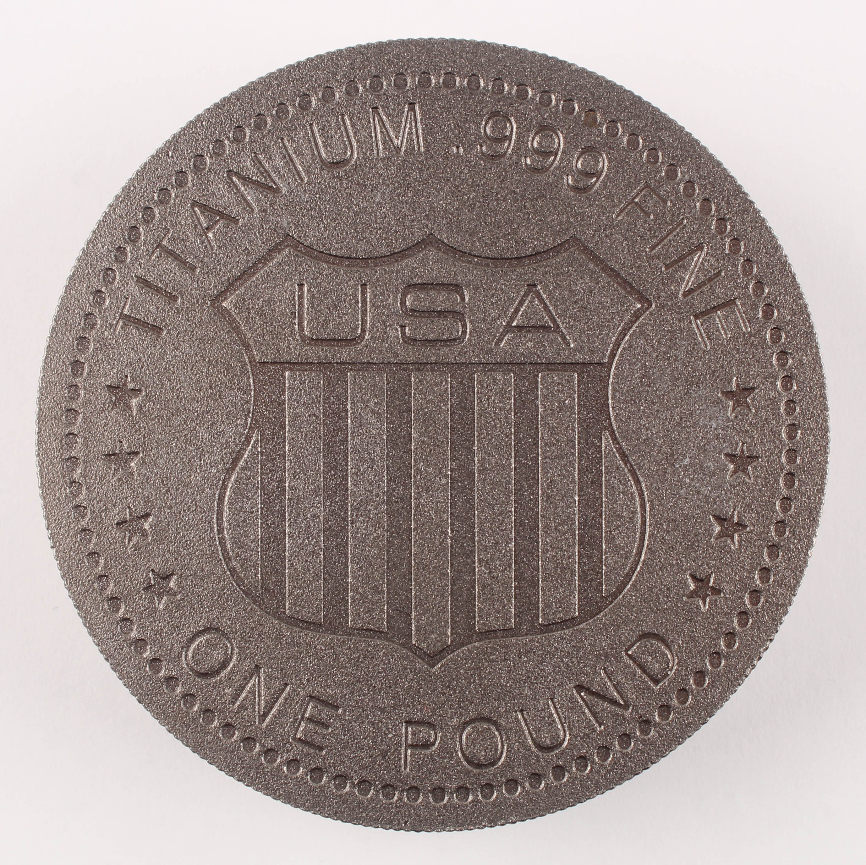 One Pound .999 Fine Titanium Element Design Bullion Round at PristineAuction.com One Pound .999 Fine Titanium Element Design Bullion Round at PristineAuction.com