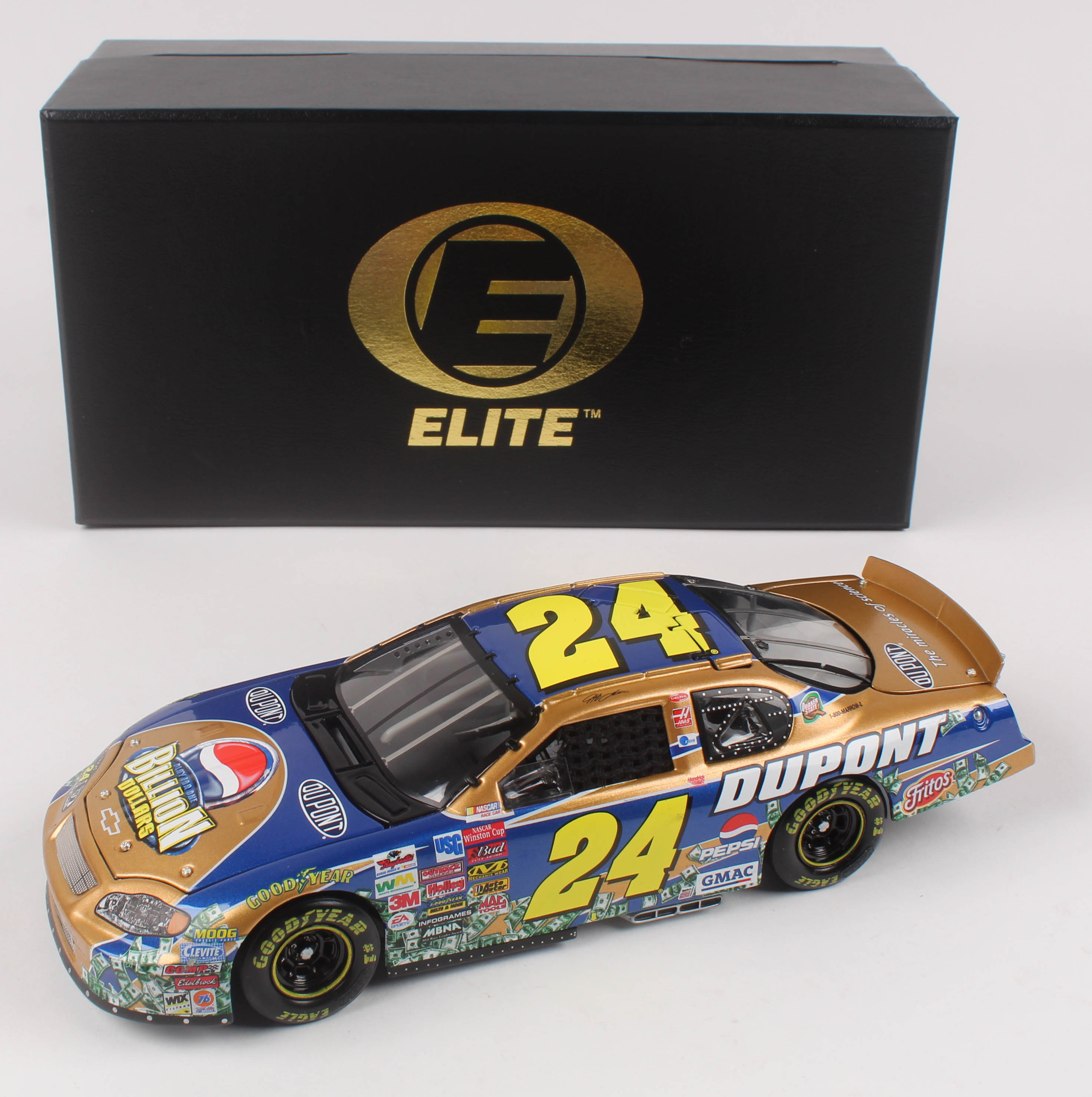 Jeff Gordon LE #24 DuPont / Pepsi Billion Dollar / 2003 Monte Carlo Elite 1:24 Die-Cast Car at PristineAuction.com Jeff Gordon LE #24 DuPont / Pepsi Billion Dollar / 2003 Monte Carlo Elite 1:24 Die-Cast Car at PristineAuction.com