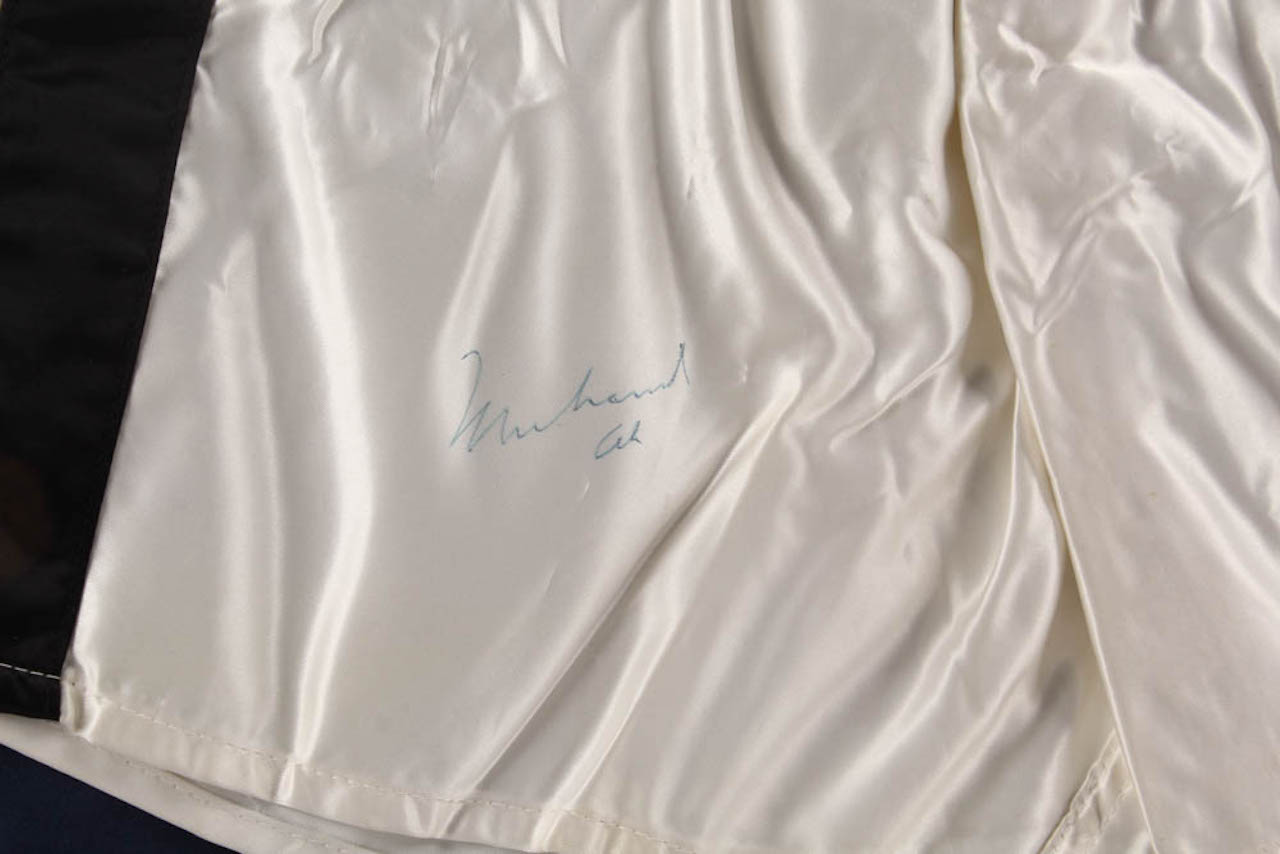 Muhammad Ali Signed 27x30 Custom Framed Boxing Trunks Display (JSA LOA) at PristineAuction.com Muhammad Ali Signed 27x30 Custom Framed Boxing Trunks Display (JSA LOA) at PristineAuction.com