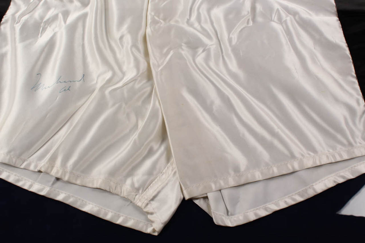 Muhammad Ali Signed 27x30 Custom Framed Boxing Trunks Display (JSA LOA) at PristineAuction.com Muhammad Ali Signed 27x30 Custom Framed Boxing Trunks Display (JSA LOA) at PristineAuction.com