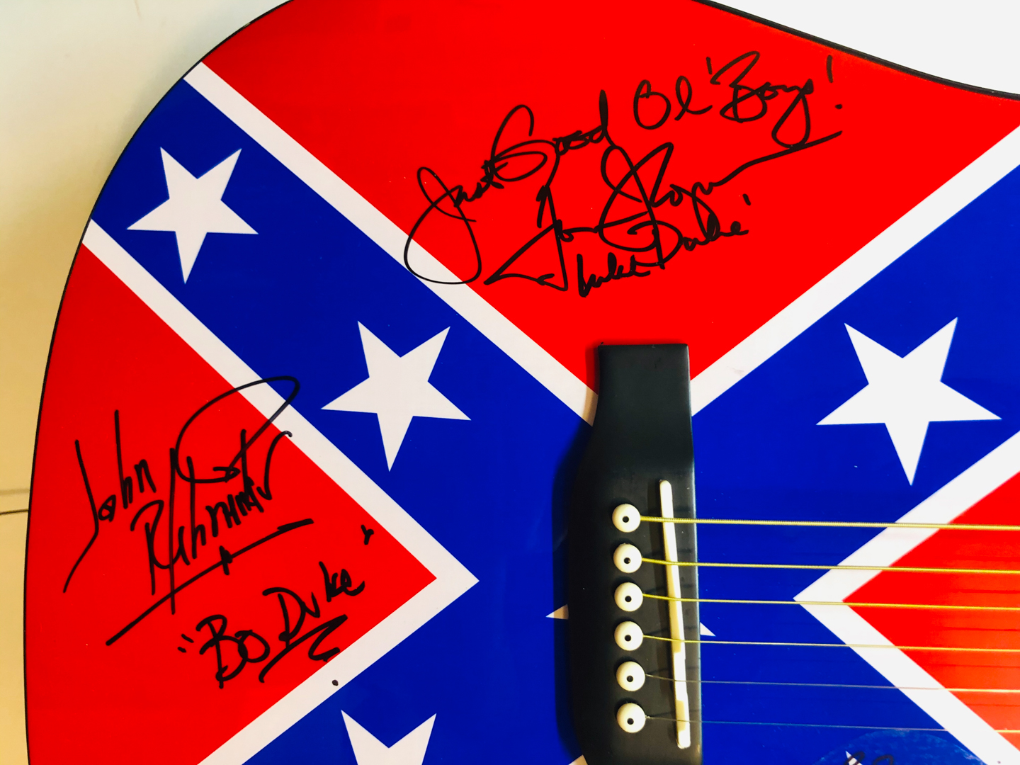 "Dukes of Hazzard" Signed Acoustic Guitar Signed by (4) with Catherine Bach, Tom Wopat, John Schneider & Ben Jones with Inscriptions (JSA COA) at PristineAuction.com "Dukes of Hazzard" Signed Acoustic Guitar Signed by (4) with Catherine Bach, Tom Wopat, John Schneider & Ben Jones with Inscriptions (JSA COA) at PristineAuction.com