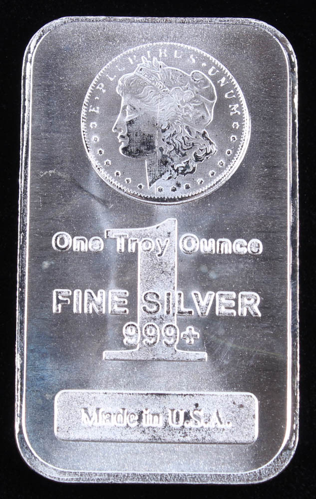 1 Troy Ounce .999 Fine Silver "Morgan" Commemorative Bullion Bar at PristineAuction.com 1 Troy Ounce .999 Fine Silver "Morgan" Commemorative Bullion Bar at PristineAuction.com