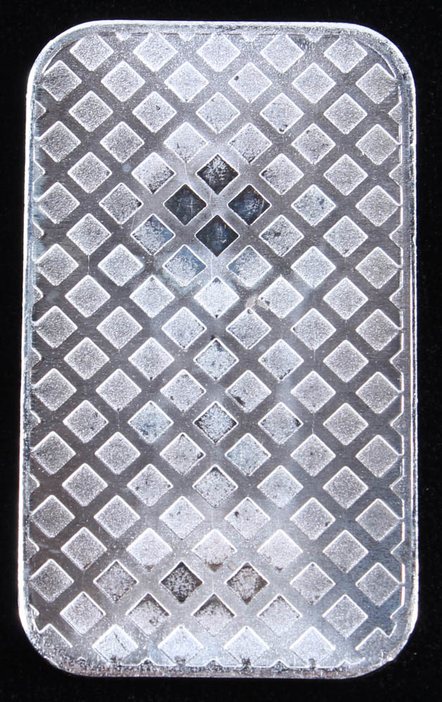 1 Troy Ounce .999 Fine Silver "Morgan" Commemorative Bullion Bar at PristineAuction.com 1 Troy Ounce .999 Fine Silver "Morgan" Commemorative Bullion Bar at PristineAuction.com