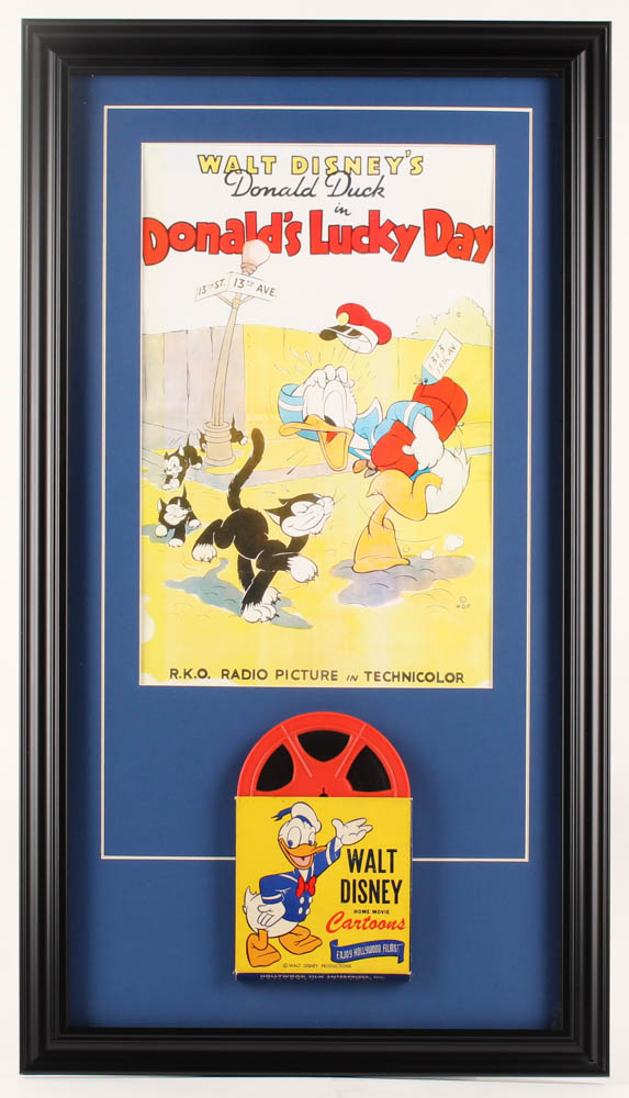 Vintage Walt Disney's Donald Duck 17x30.5 Custom Framed 1960's Original 8mm Film Reel Display with Original Packaging at PristineAuction.com Vintage Walt Disney's Donald Duck 17x30.5 Custom Framed 1960's Original 8mm Film Reel Display with Original Packaging at PristineAuction.com