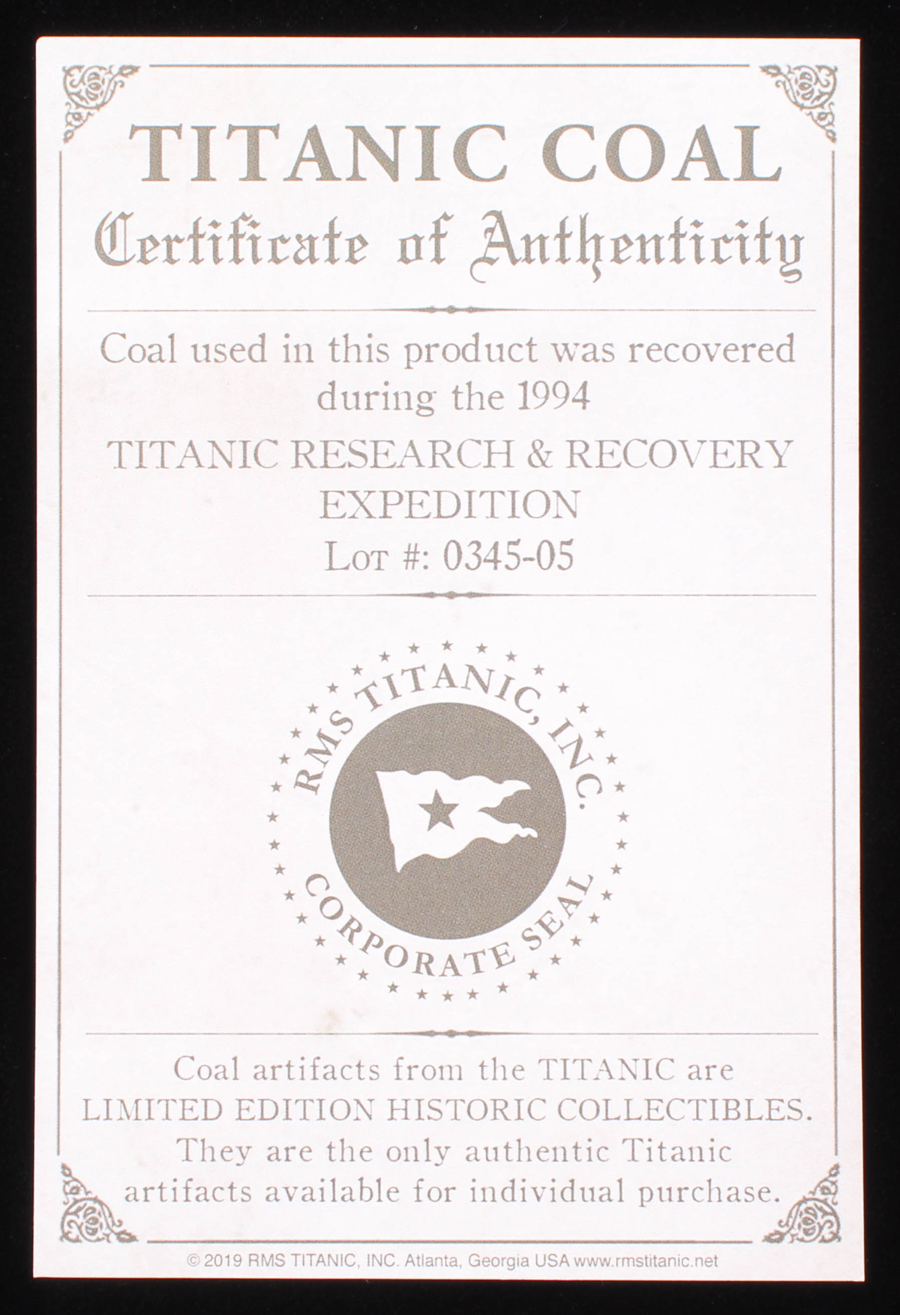 Authentic Coal From Titanic Wreckage in Bronze Keychain (RMS Titanic COA) at PristineAuction.com Authentic Coal From Titanic Wreckage in Bronze Keychain (RMS Titanic COA) at PristineAuction.com