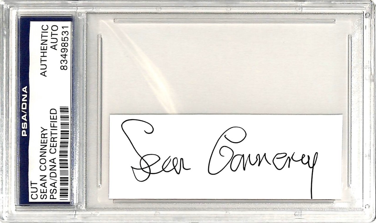 Sean Connery Signed 1.25x3.25 Cut (PSA Encapsulated) at PristineAuction.com Sean Connery Signed 1.25x3.25 Cut (PSA Encapsulated) at PristineAuction.com