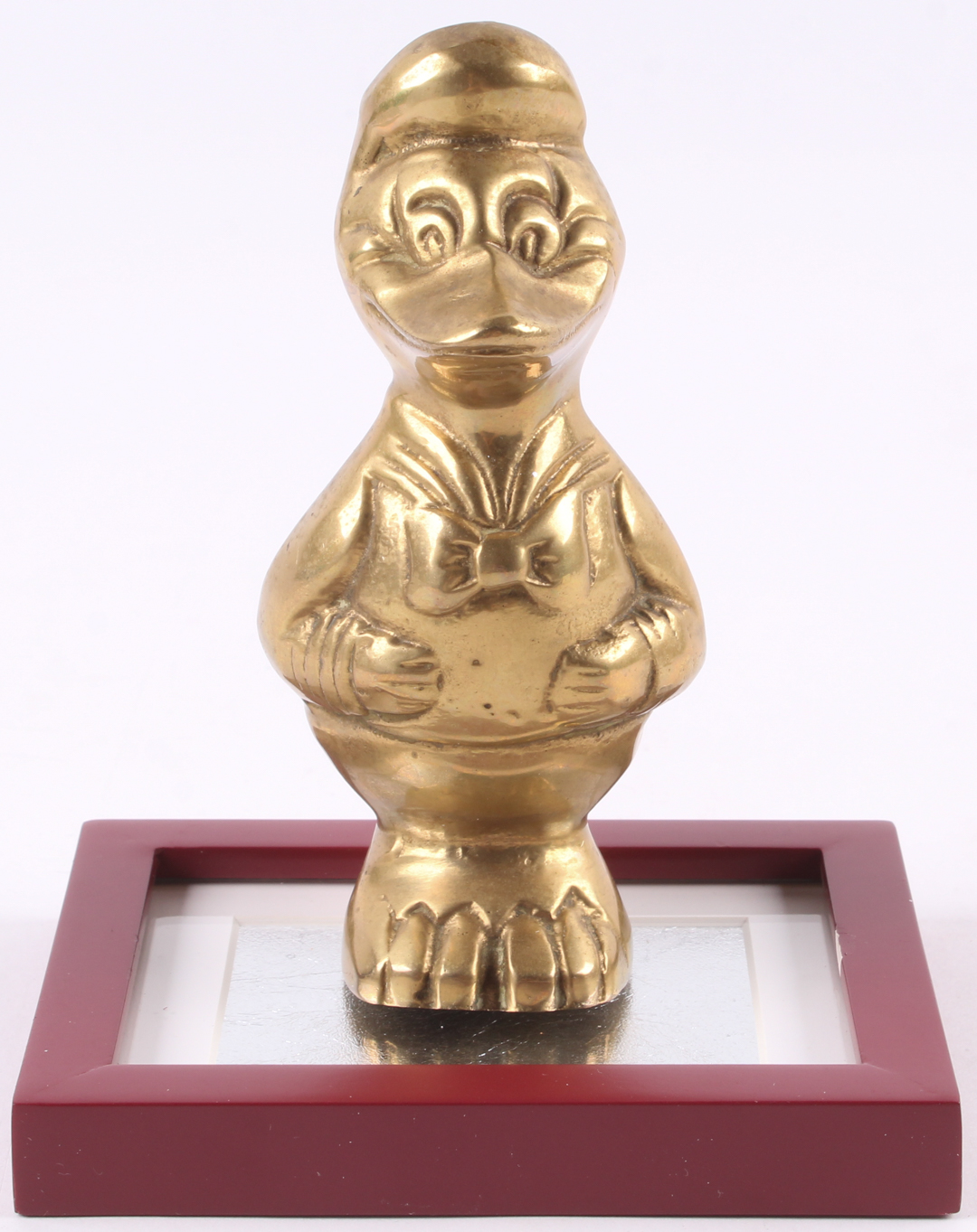 Vintage 1960's Walt Disney's Donald Duck Solid Brass Figure With Glass Display Base at PristineAuction.com Vintage 1960's Walt Disney's Donald Duck Solid Brass Figure With Glass Display Base at PristineAuction.com