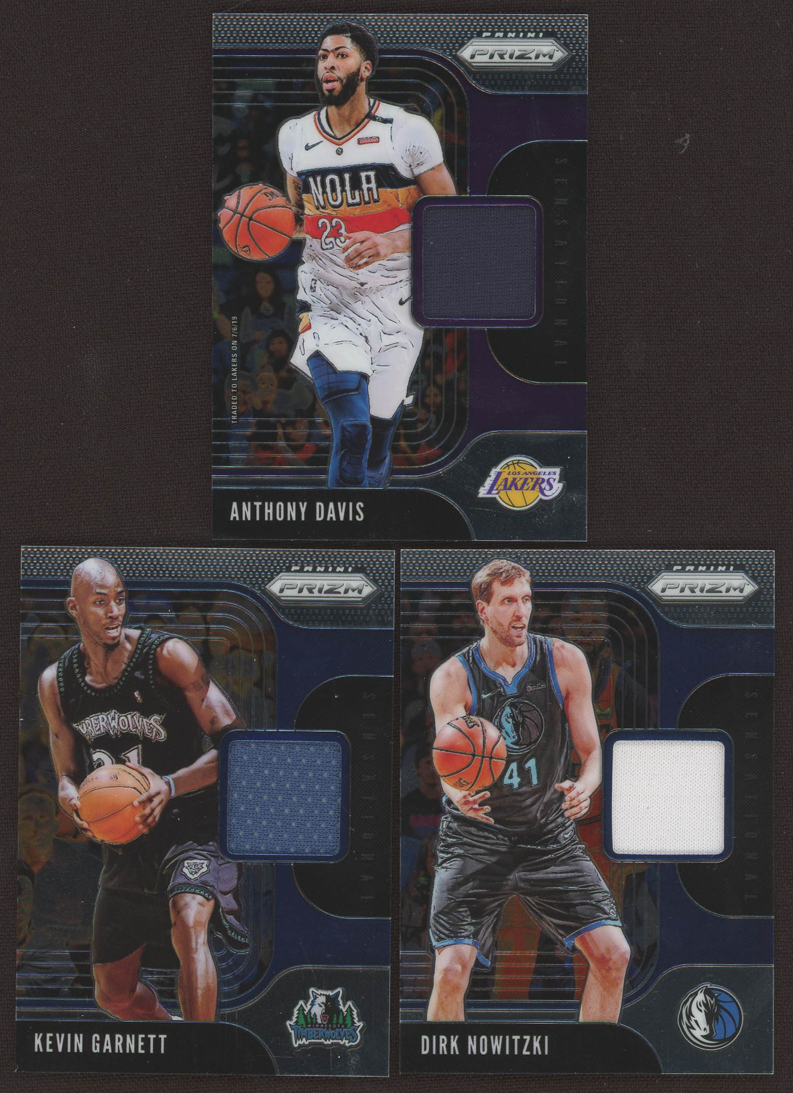 Lot of (3) 2019-20 Panini Prizm Sensational Swatches Basketball Cards with #76 Anthony Davis, #41 Dirk Nowitzki # #70 Kevin Garnett at PristineAuction.com Lot of (3) 2019-20 Panini Prizm Sensational Swatches Basketball Cards with #76 Anthony Davis, #41 Dirk Nowitzki # #70 Kevin Garnett at PristineAuction.com