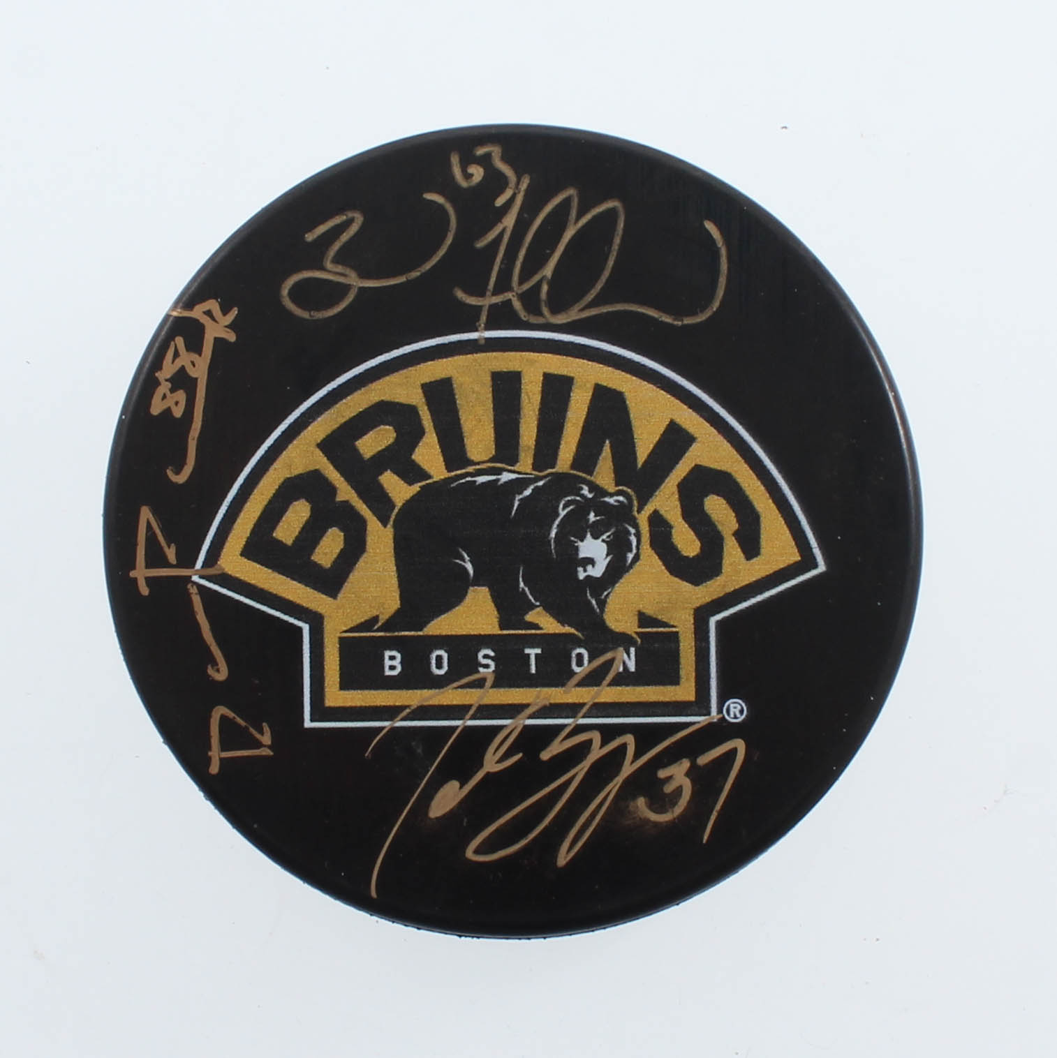 Brad Marchand, Patrice Bergeron & David Pastrnak Signed Bruins Logo Hockey Puck (YSMS COA) at PristineAuction.com Brad Marchand, Patrice Bergeron & David Pastrnak Signed Bruins Logo Hockey Puck (YSMS COA) at PristineAuction.com