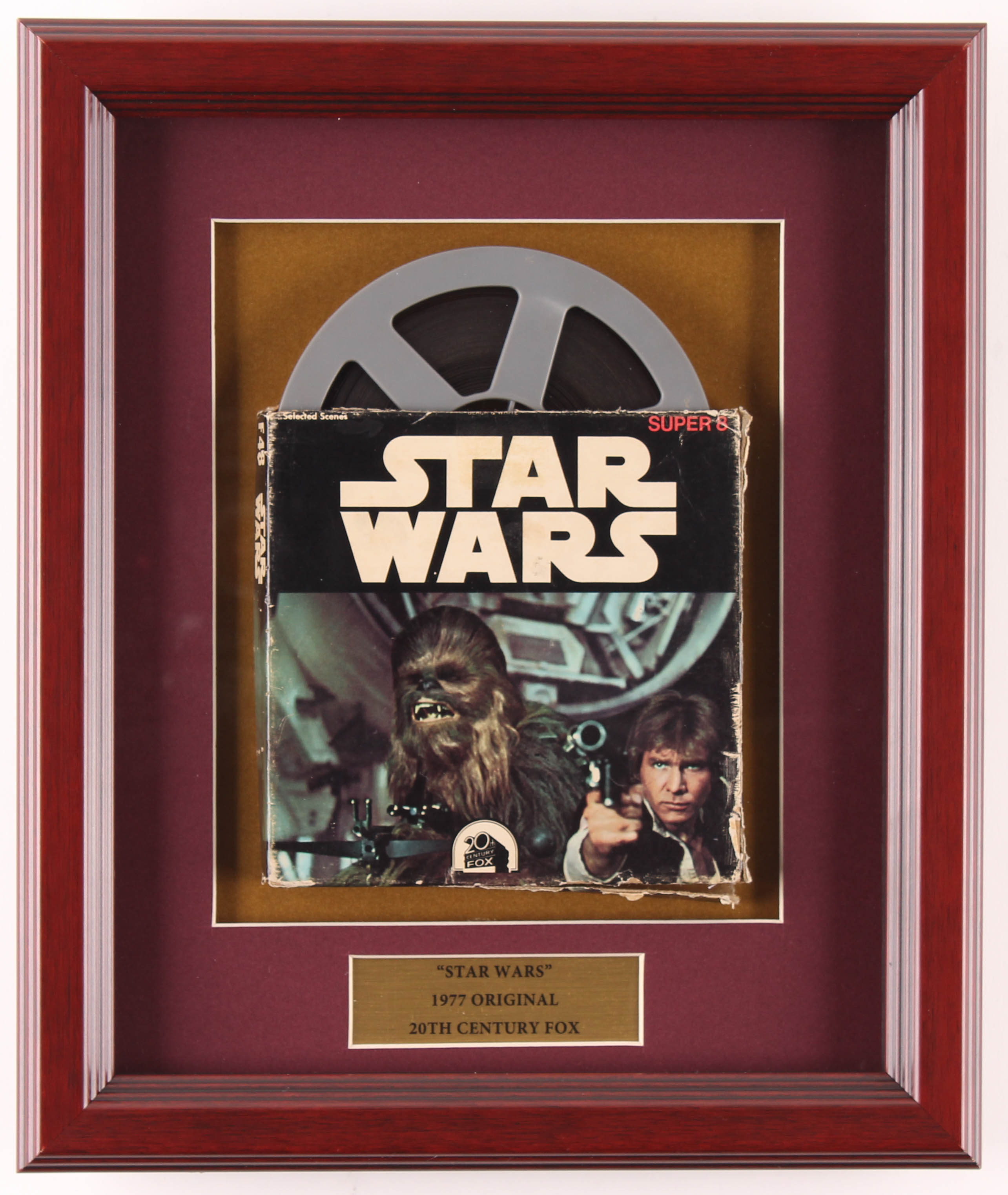 Vintage 1977 "Star Wars" 10.75x12.75 Custom Framed 8mm Film Reel Display at PristineAuction.com Vintage 1977 "Star Wars" 10.75x12.75 Custom Framed 8mm Film Reel Display at PristineAuction.com