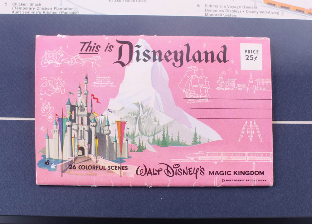 Disneyland 15.5x26.5 Custom Framed Vintage 1962 Map Display with Photo Packet & Ticket Book at PristineAuction.com Disneyland 15.5x26.5 Custom Framed Vintage 1962 Map Display with Photo Packet & Ticket Book at PristineAuction.com