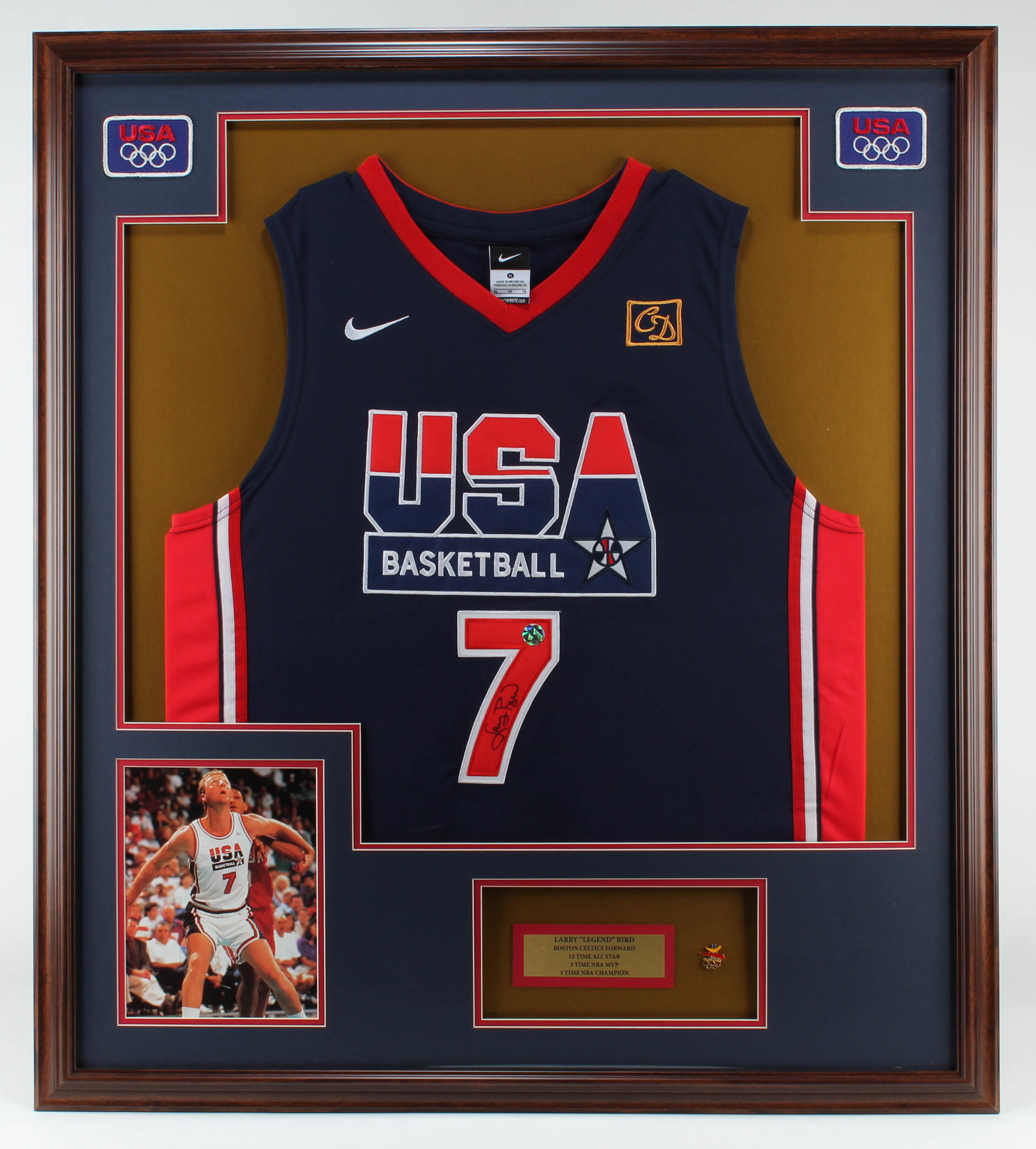 Larry Bird Signed Team USA 32.5x36.5 Custom Framed Jersey with 1992 Barcelona Olympics Pin (Bird Hologram) at PristineAuction.com Larry Bird Signed Team USA 32.5x36.5 Custom Framed Jersey with 1992 Barcelona Olympics Pin (Bird Hologram) at PristineAuction.com