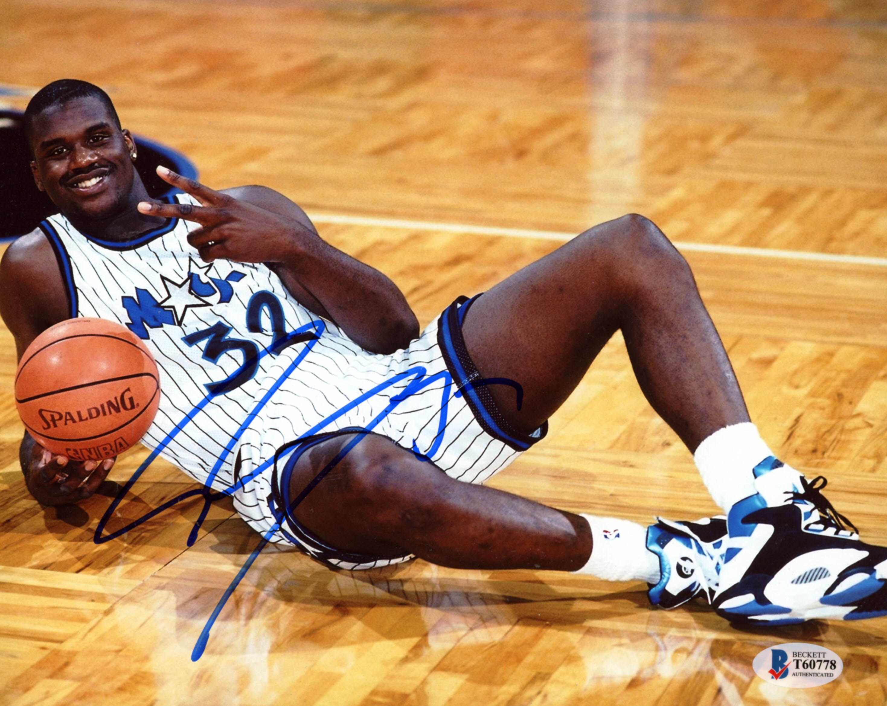 Shaquille O'Neal Signed Magic 8x10 Photo (Beckett COA) at PristineAuction.com Shaquille O'Neal Signed Magic 8x10 Photo (Beckett COA) at PristineAuction.com