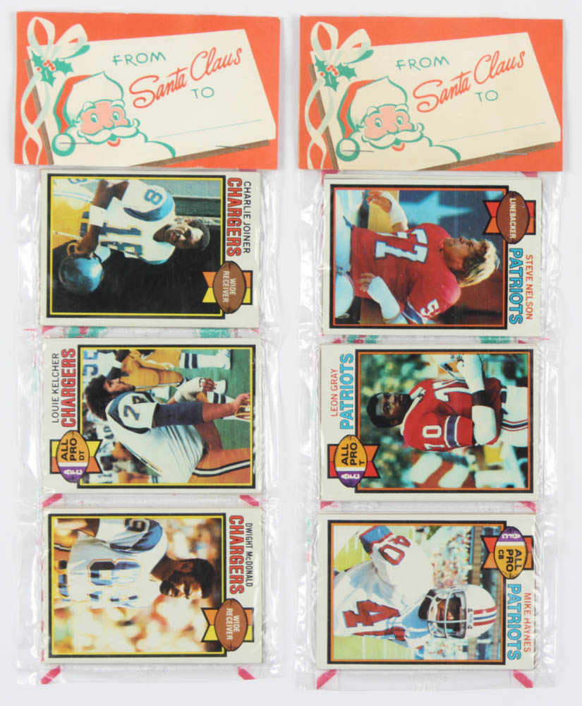 Lot of (8) 1979 Topps Unopened Football & Baseball Christmas Rack Packs of (12) Cards with #389 Ed O'Neil All-Pro, #291 Jack Gregory All-Pro, & #233 Charlie Joiner All-Pro