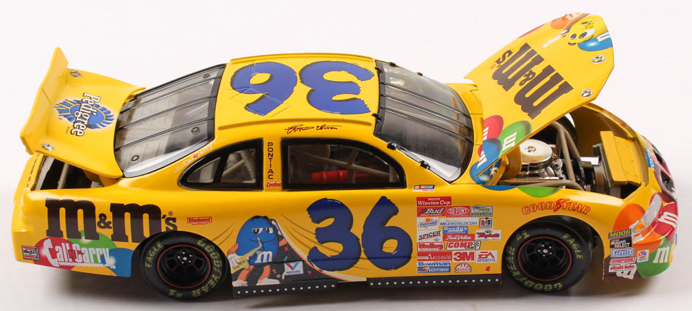 Ernie Irvan LE #36 M&M Milennium Countdown / 1999 Pontiac 1:24 Scale Die Cast Car at PristineAuction.com Ernie Irvan LE #36 M&M Milennium Countdown / 1999 Pontiac 1:24 Scale Die Cast Car at PristineAuction.com