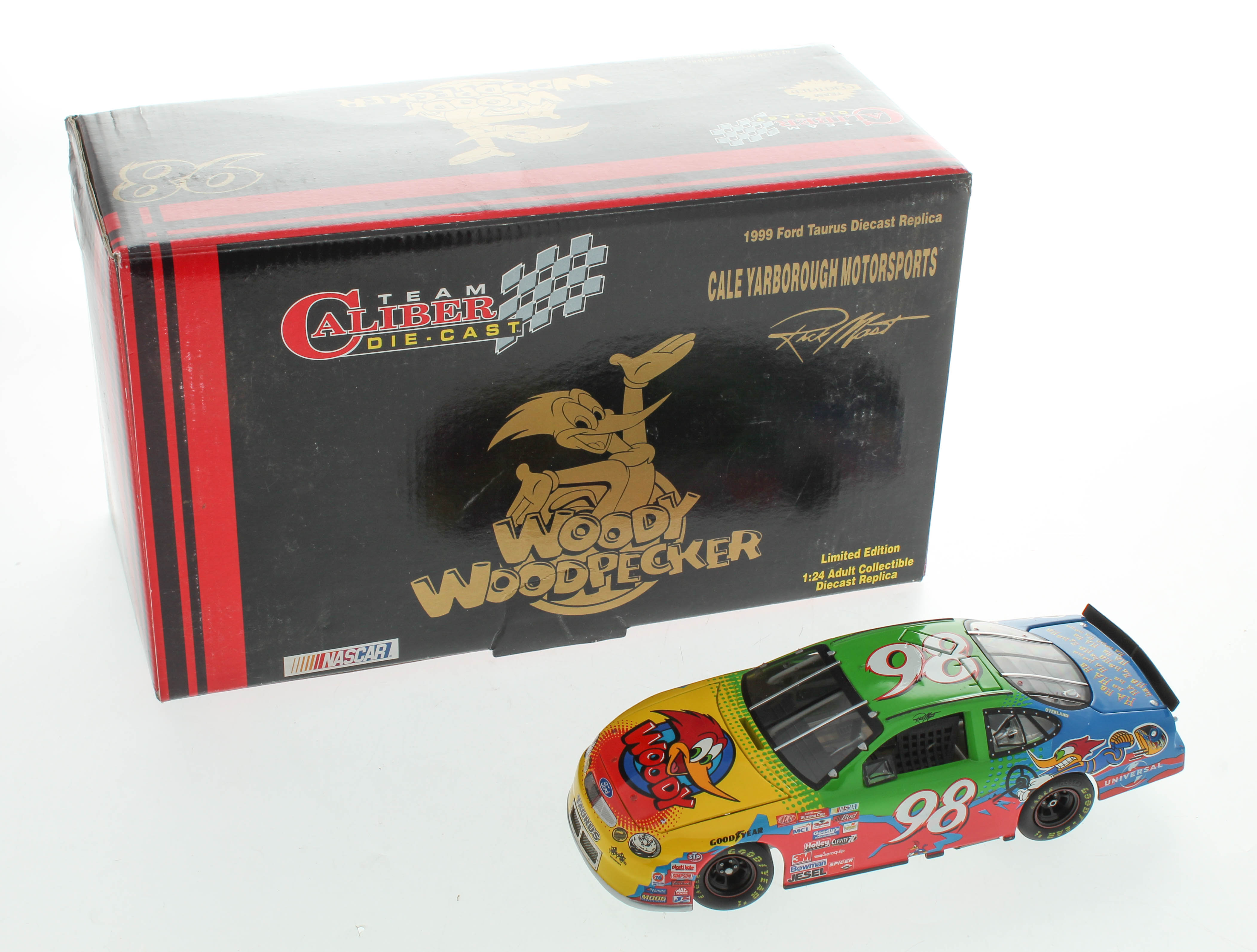 Rick Mast LE #98 Woody Woodpecker / 1999 Taurus 1:24 Scale Die-Cast Car at PristineAuction.com Rick Mast LE #98 Woody Woodpecker / 1999 Taurus 1:24 Scale Die-Cast Car at PristineAuction.com