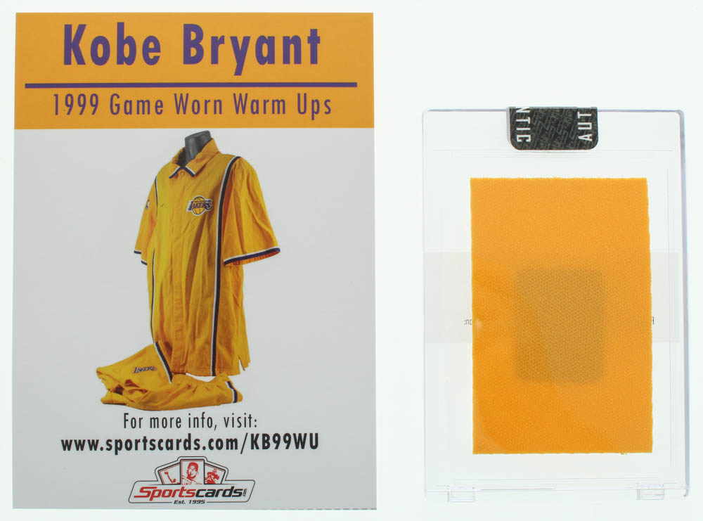 Lot of (2) Kobe Bryant Items With Signed NBA Basketball With Display Case & 1999 Game Worn Warm Ups Piece (Beckett LOA & PSA Hologram) at PristineAuction.com Lot of (2) Kobe Bryant Items With Signed NBA Basketball With Display Case & 1999 Game Worn Warm Ups Piece (Beckett LOA & PSA Hologram) at PristineAuction.com