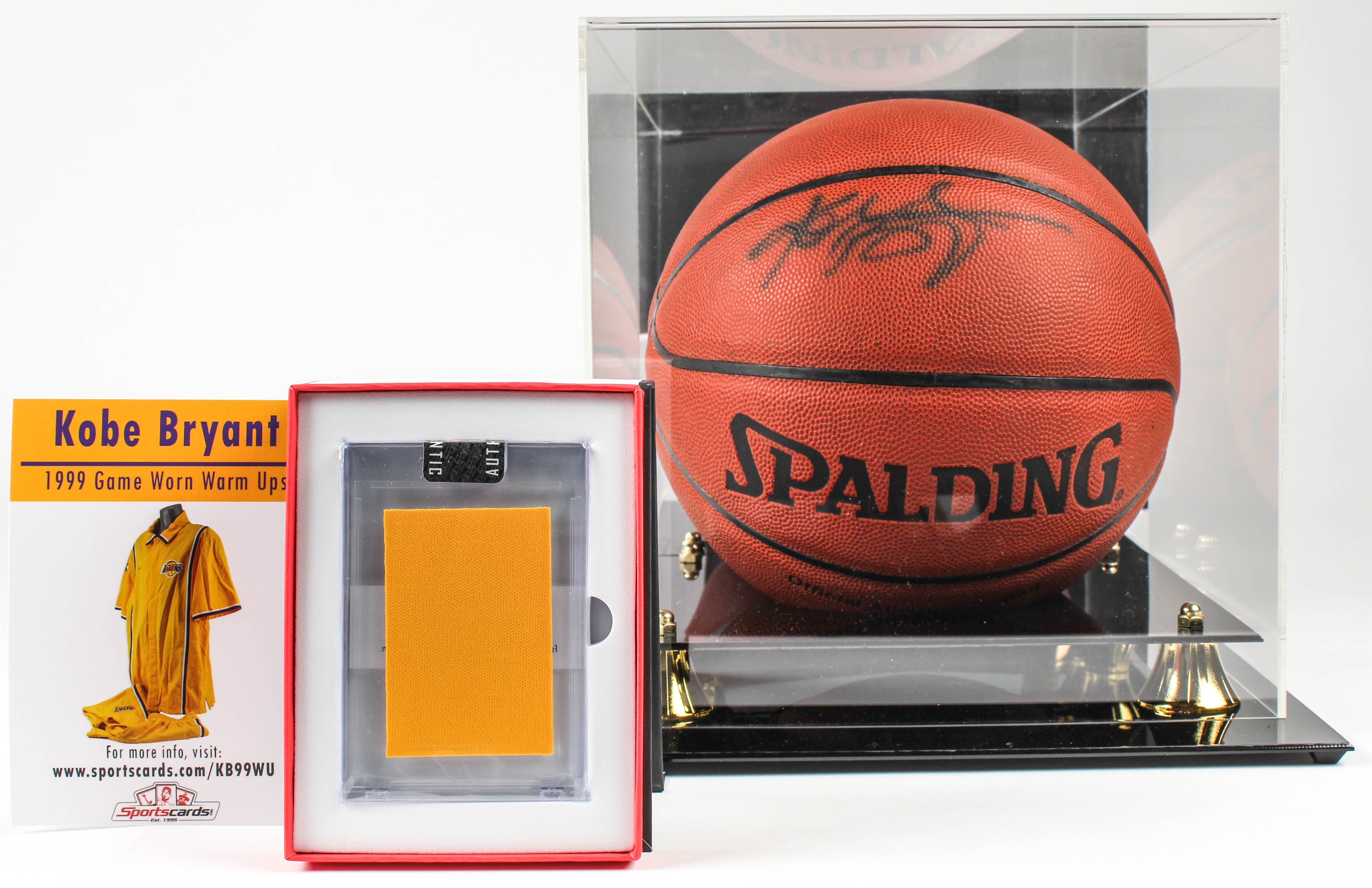 Lot of (2) Kobe Bryant Items With Signed NBA Basketball With Display Case & 1999 Game Worn Warm Ups Piece (Beckett LOA & PSA Hologram) at PristineAuction.com Lot of (2) Kobe Bryant Items With Signed NBA Basketball With Display Case & 1999 Game Worn Warm Ups Piece (Beckett LOA & PSA Hologram) at PristineAuction.com