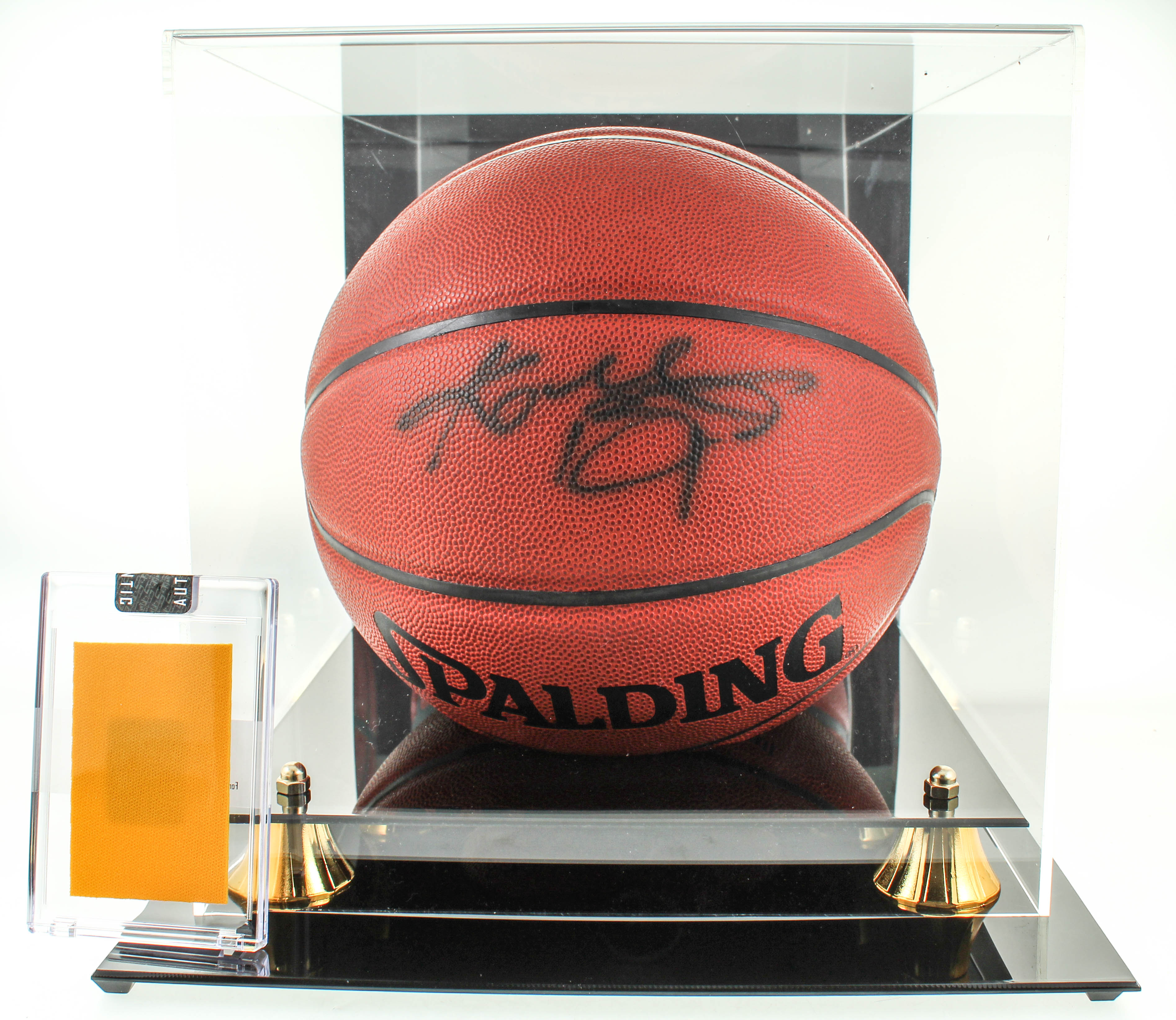 Lot of (2) Kobe Bryant Items With Signed NBA Basketball With Display Case & 1999 Game Worn Warm Ups Piece (Beckett LOA & PSA Hologram) at PristineAuction.com Lot of (2) Kobe Bryant Items With Signed NBA Basketball With Display Case & 1999 Game Worn Warm Ups Piece (Beckett LOA & PSA Hologram) at PristineAuction.com